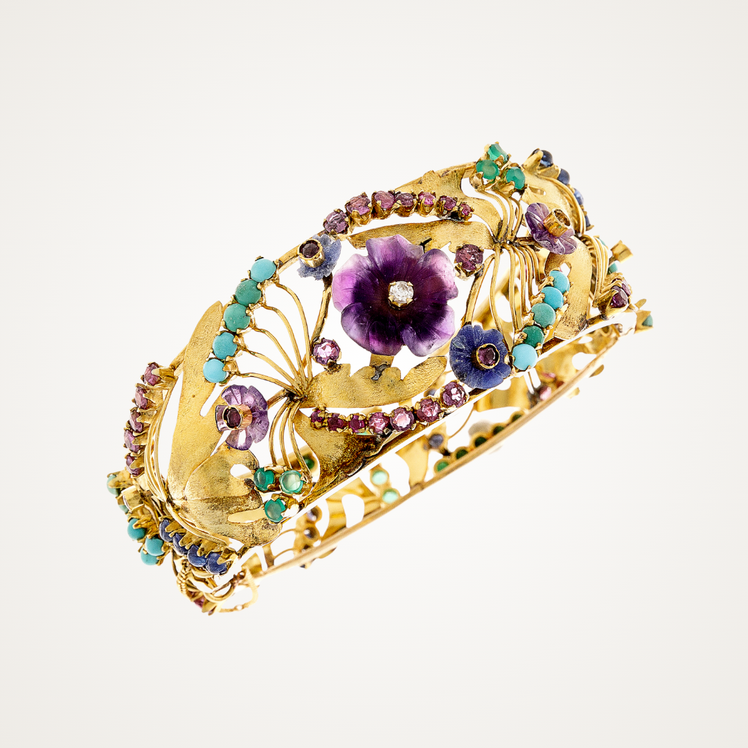 Vintage and antique bracelets collection, showcasing Art Nouveau statement bangle.