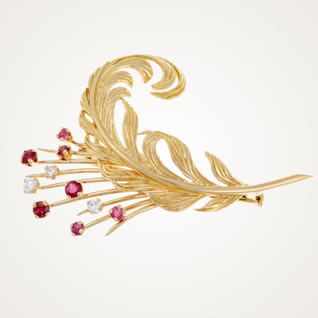Vintage and antique brooches collection, showcasing a Retro statement piece with gemstones.