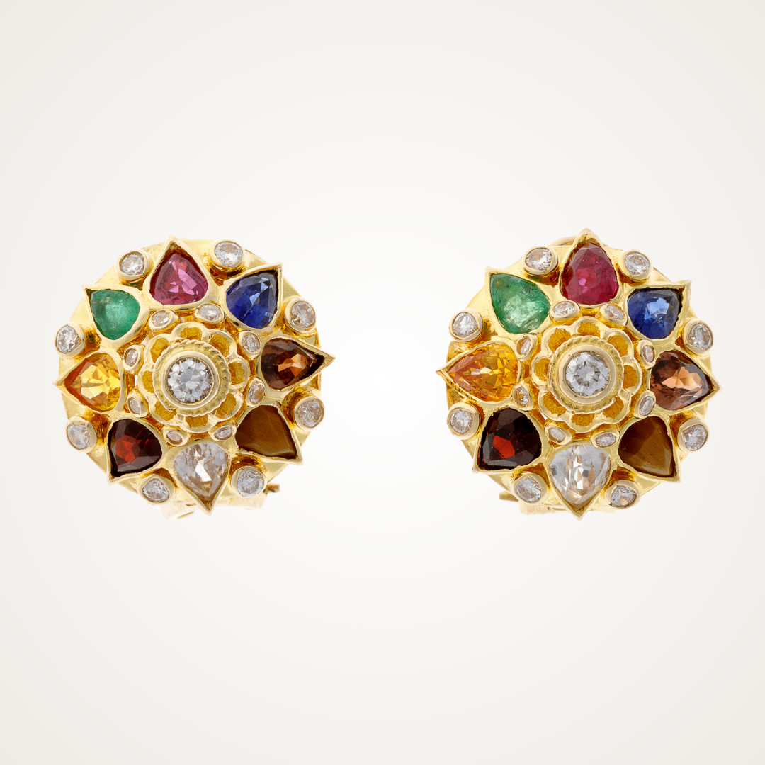 Curated vintage colored gemstone jewelry featuring sapphire, ruby, and emerald rings, necklaces, earrings, and bracelets.