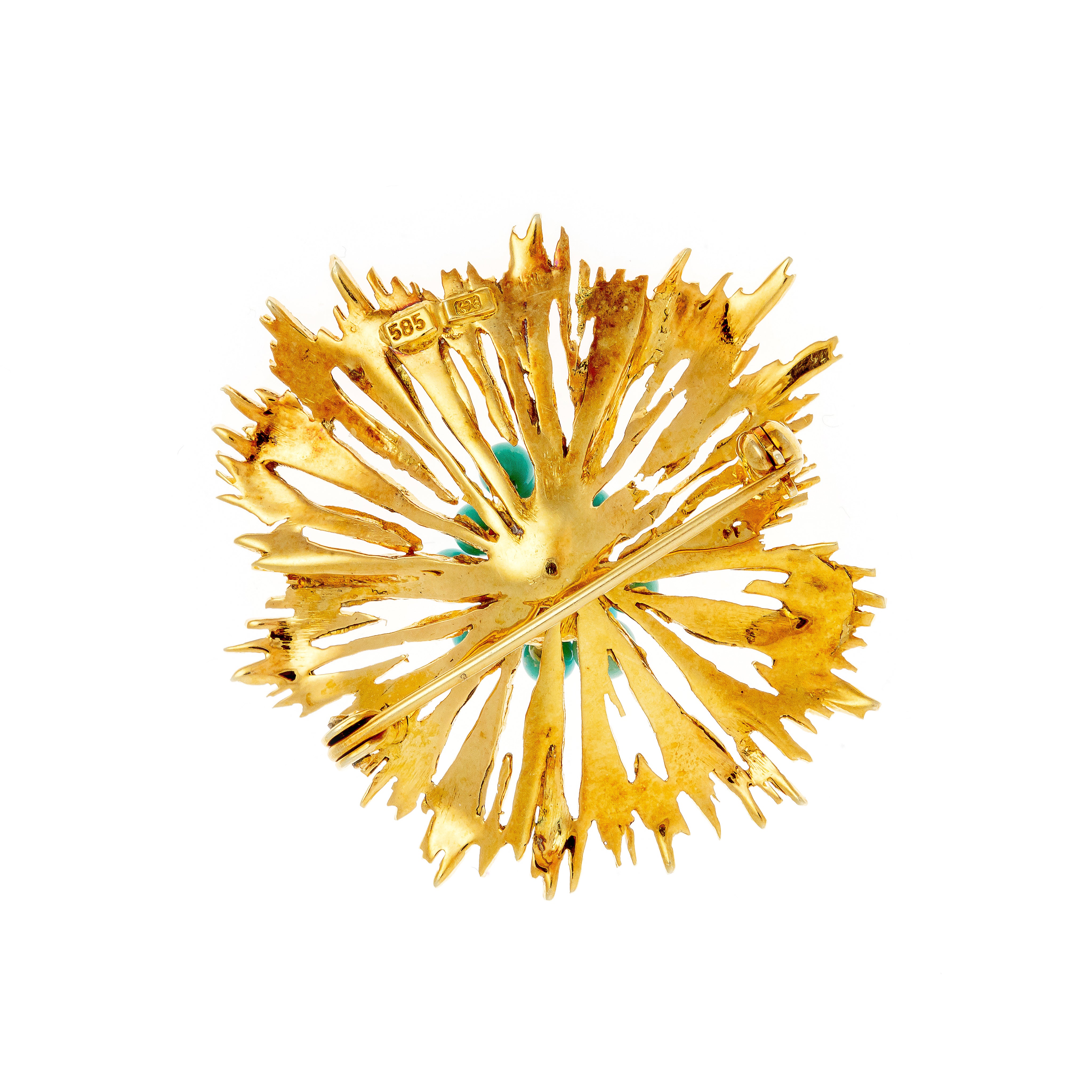 Back of a 1970s French Brutalist gold brooch, showcasing the goldwork structure and pin mechanism.