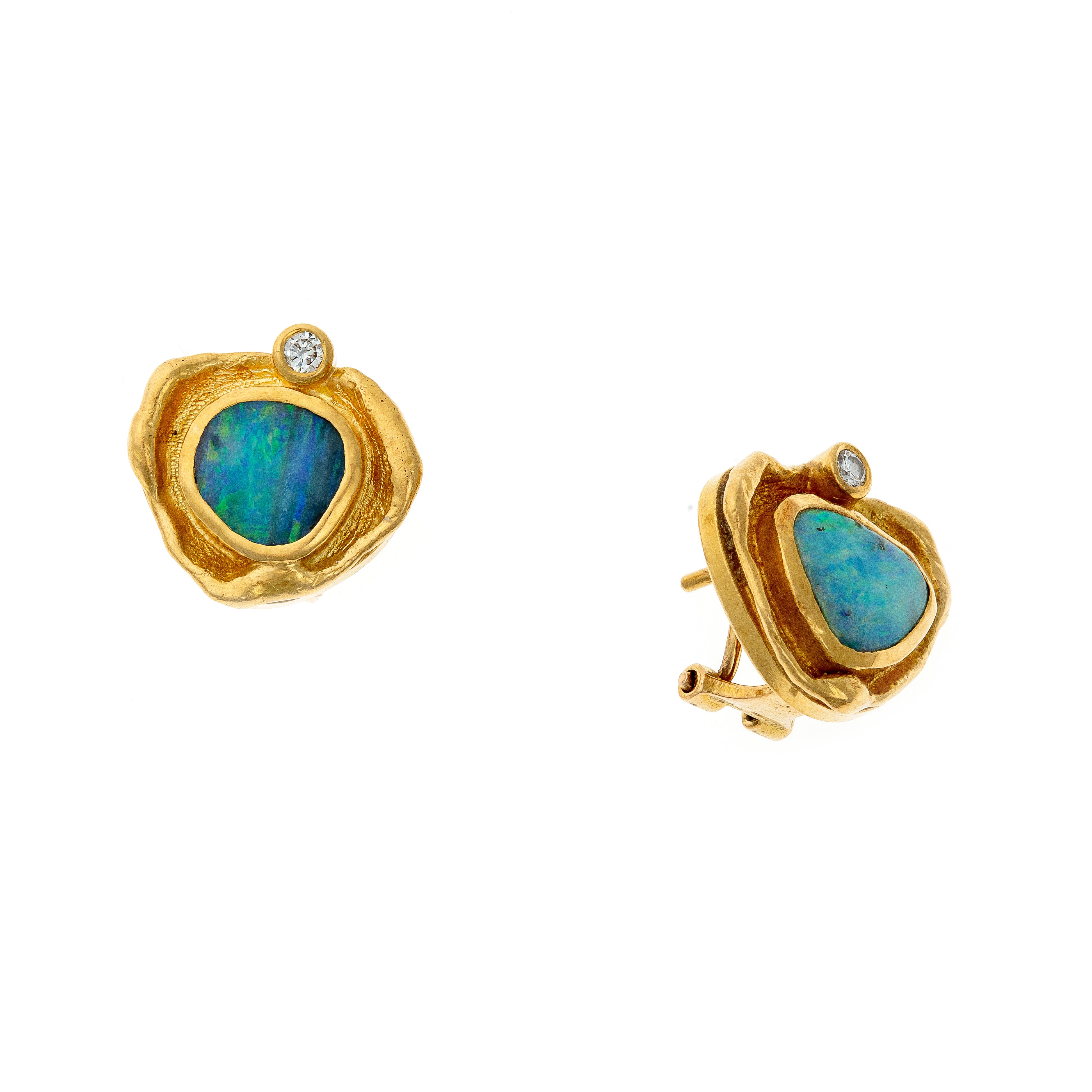 Angled perspective of the vintage opal earrings, emphasizing the sculptural gold design and natural opal's iridescent play of color.