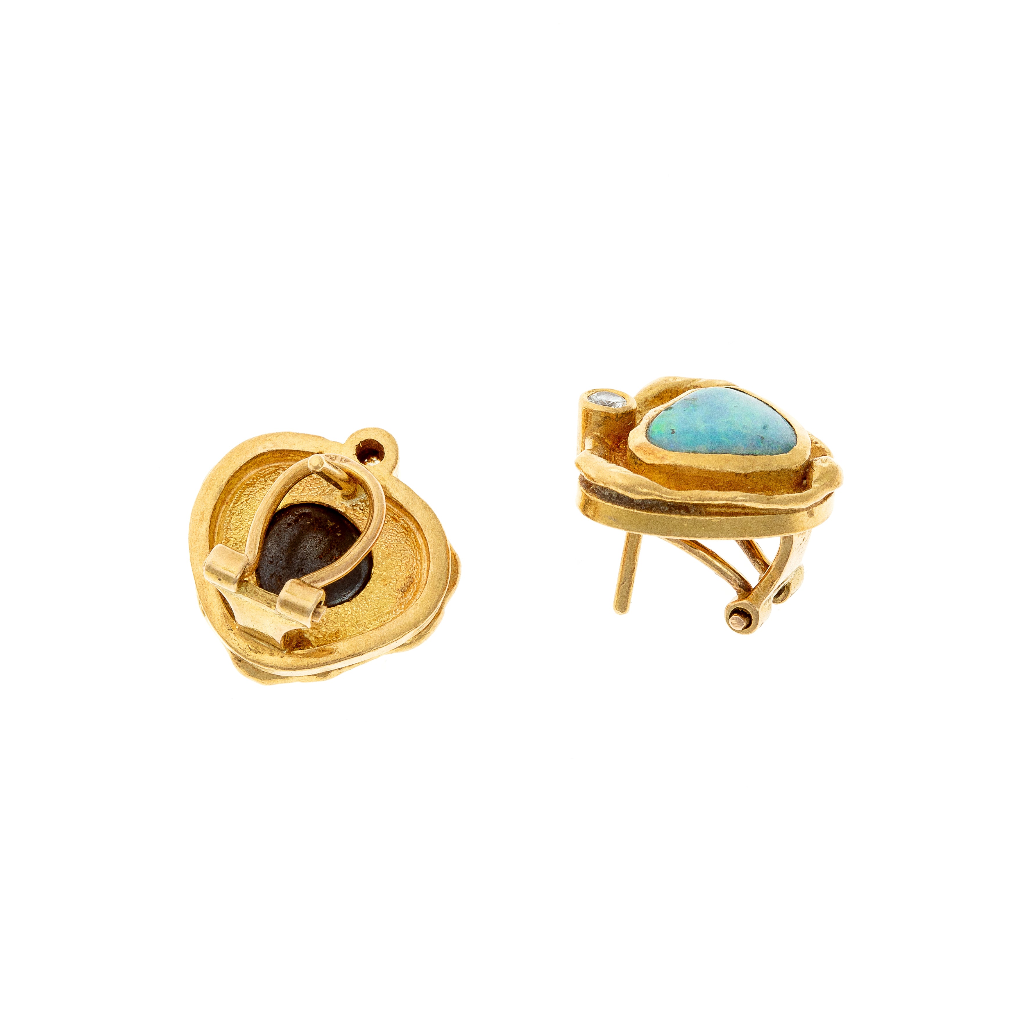 Back view of the 1970s gold and opal earrings, highlighting the intricate craftsmanship and secure clip-on fastening.