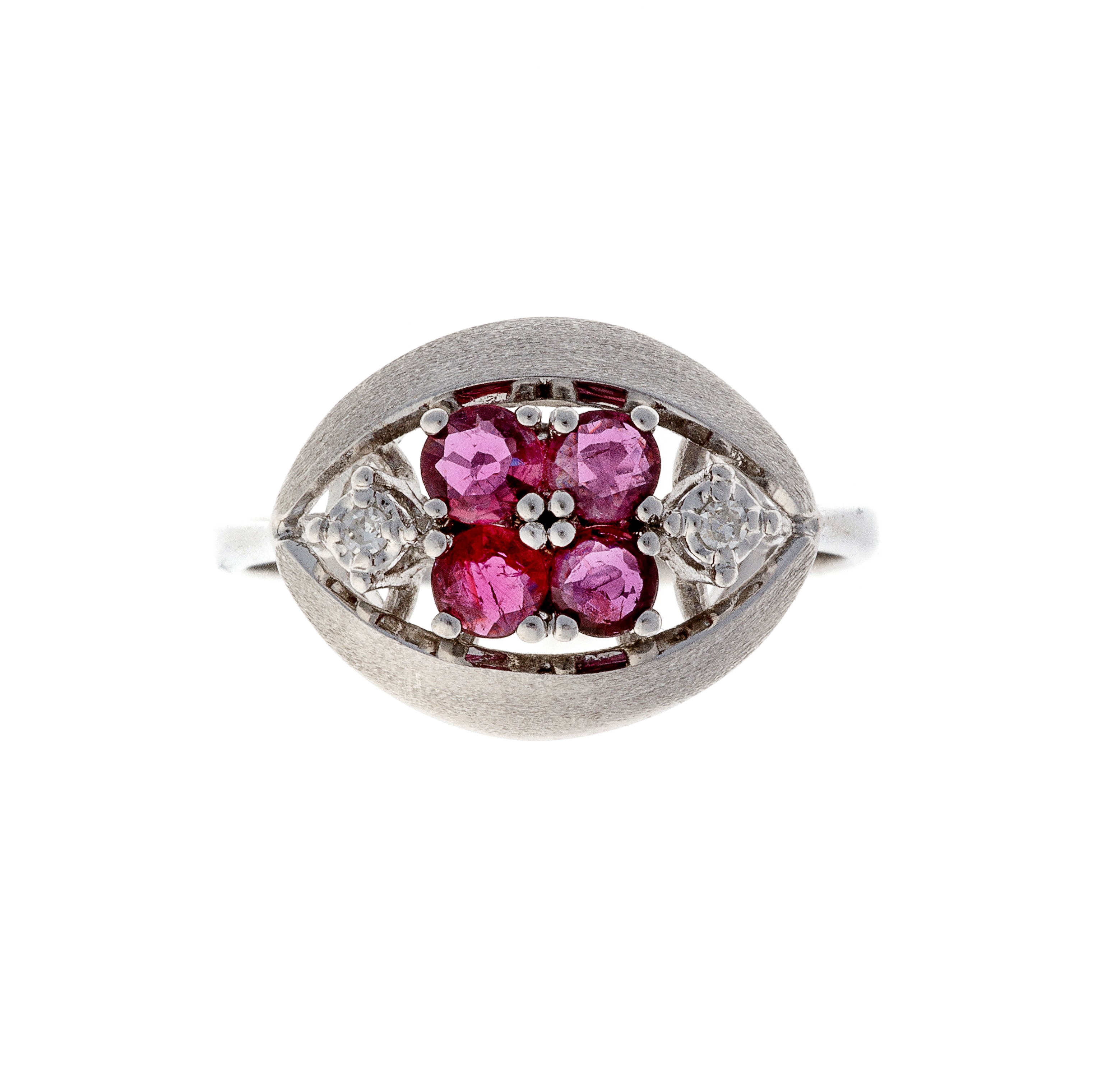 Vintage 1980s Belgian white gold ring with ruby floral motif and diamonds in an Edwardian revival style.