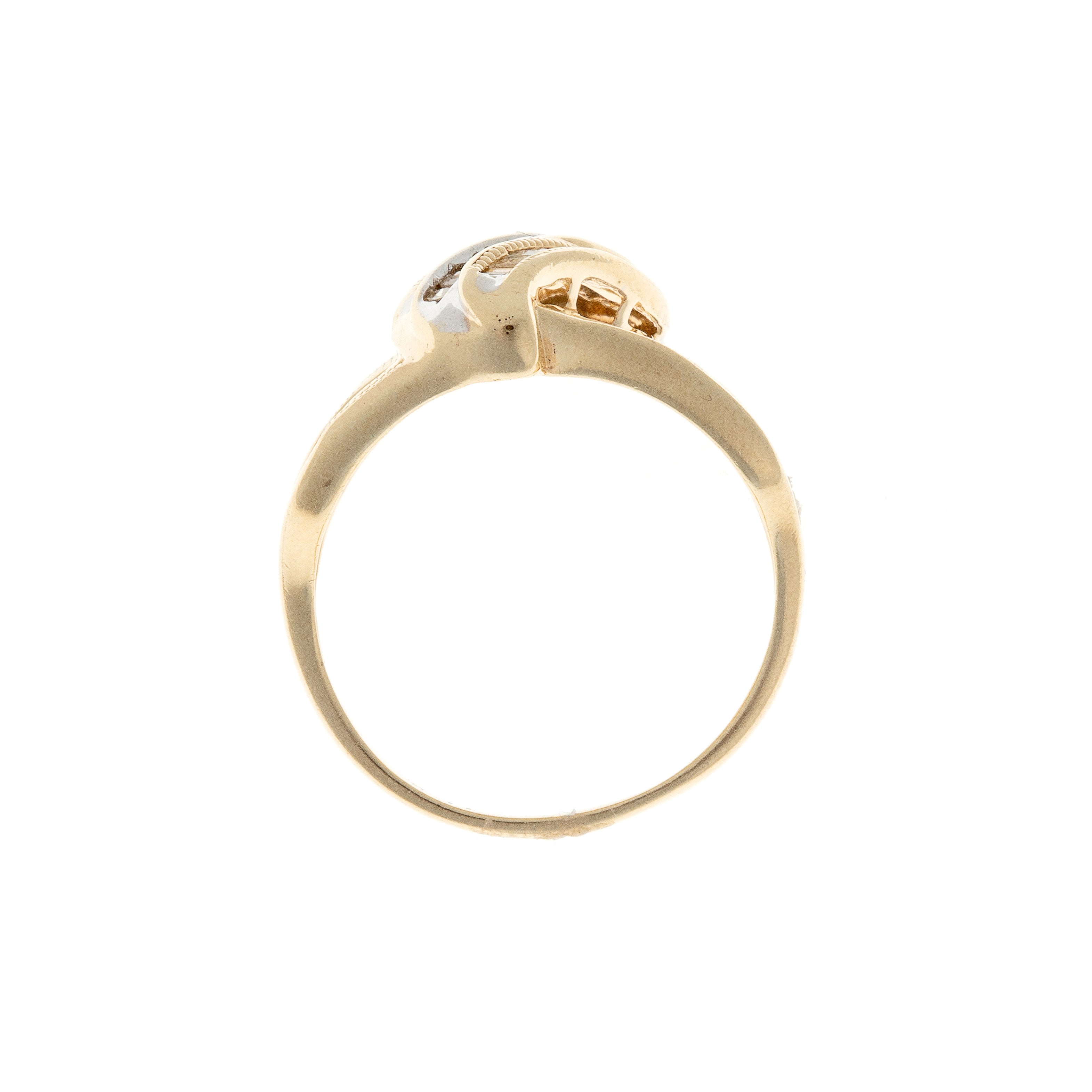 Side view of 9K gold French ring with 69 diamonds in wave-inspired setting.