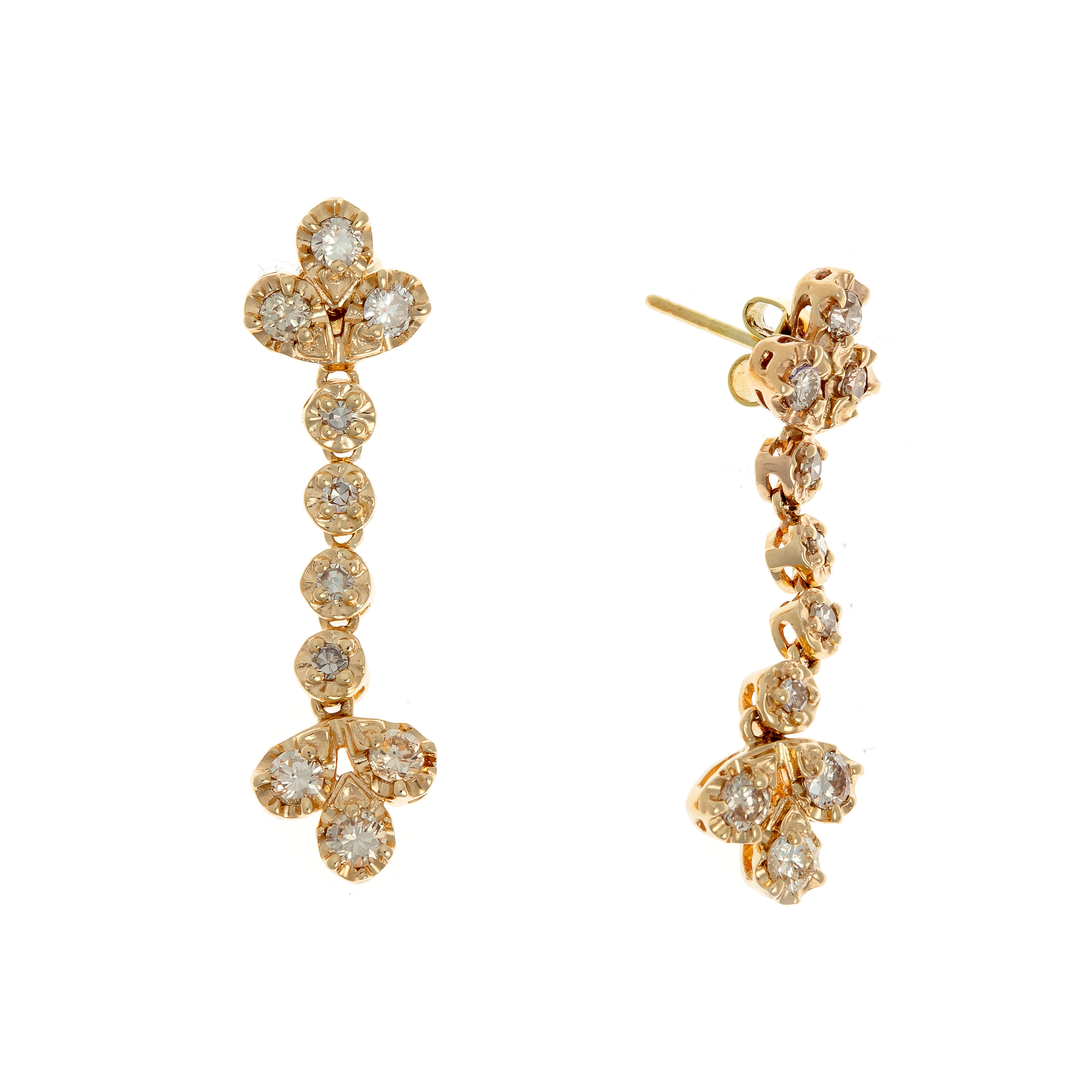 Angled perspective of the diamond earrings, highlighting the fluid movement and sparkling brilliance of each diamond setting.