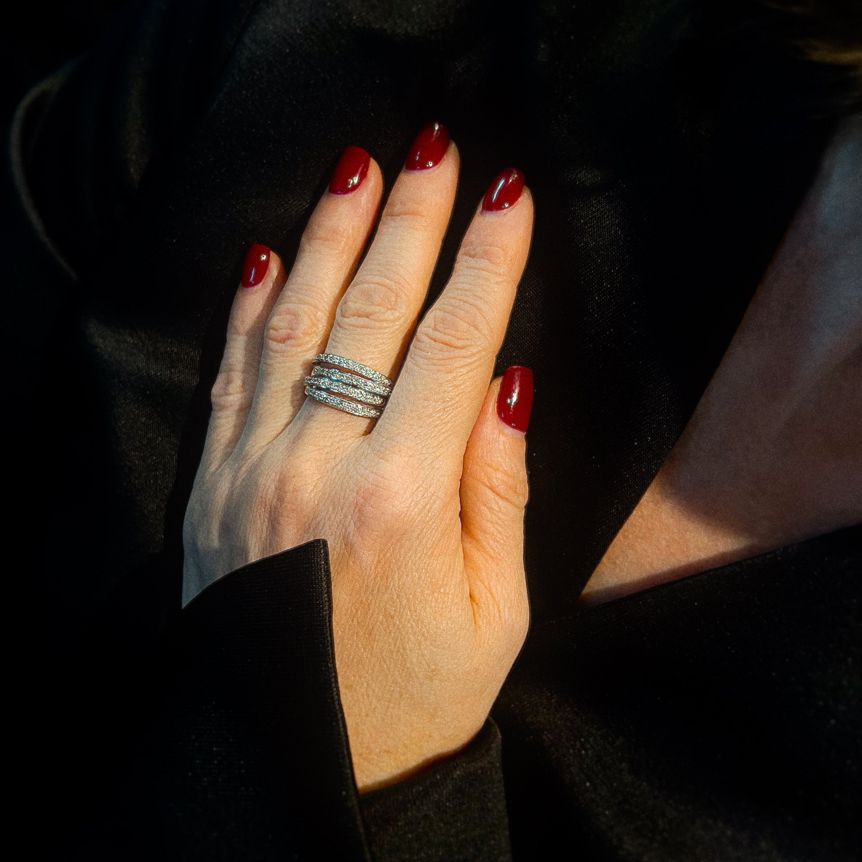 Model wearing the vintage white gold multi-row ring with diamonds.