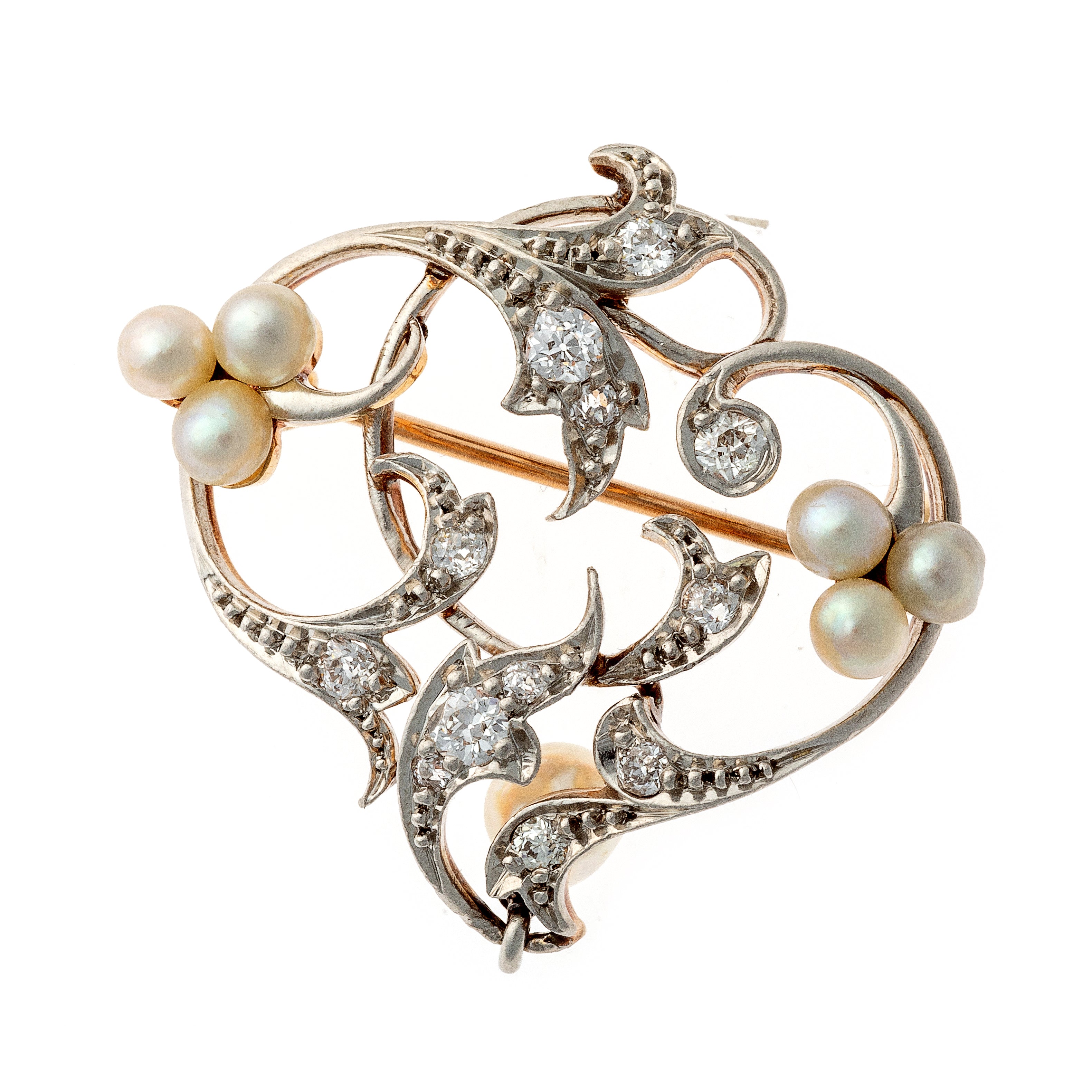 Angled view of the Art Nouveau platinum and gold diamond and pearl brooch.