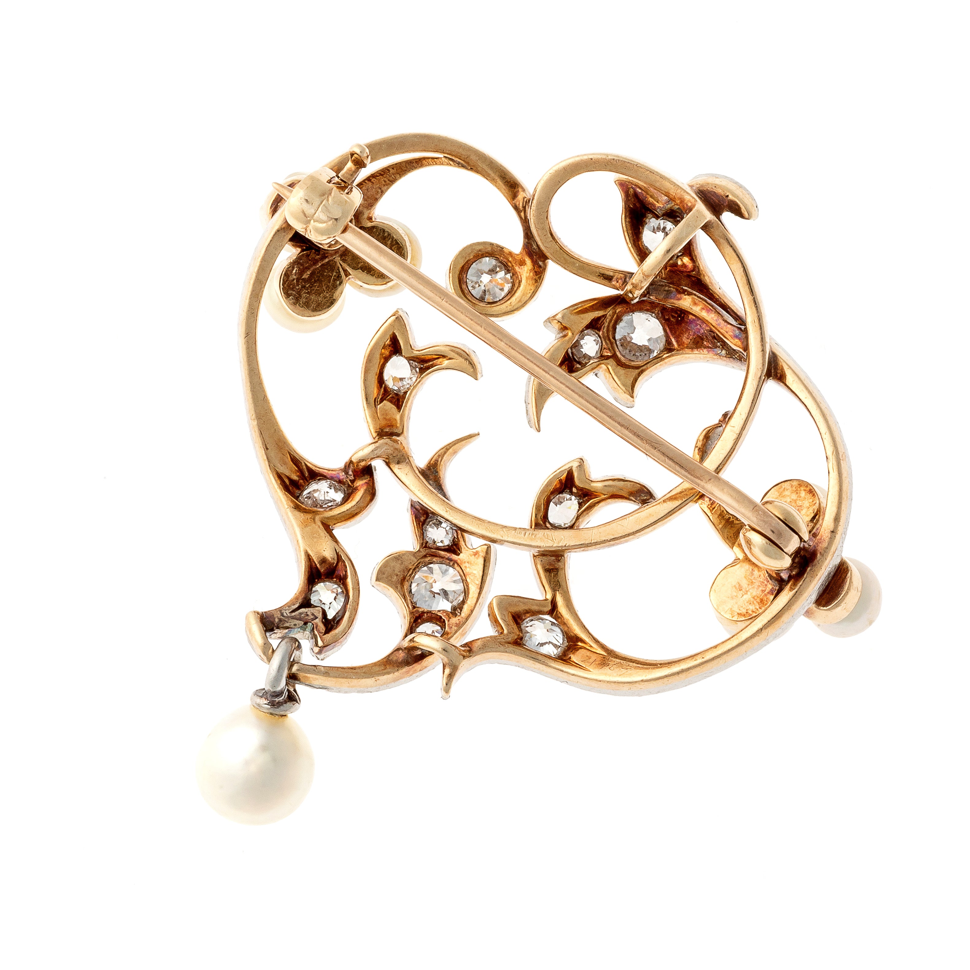 Back of the Art Nouveau brooch, showing the gold structure and pin mechanism.