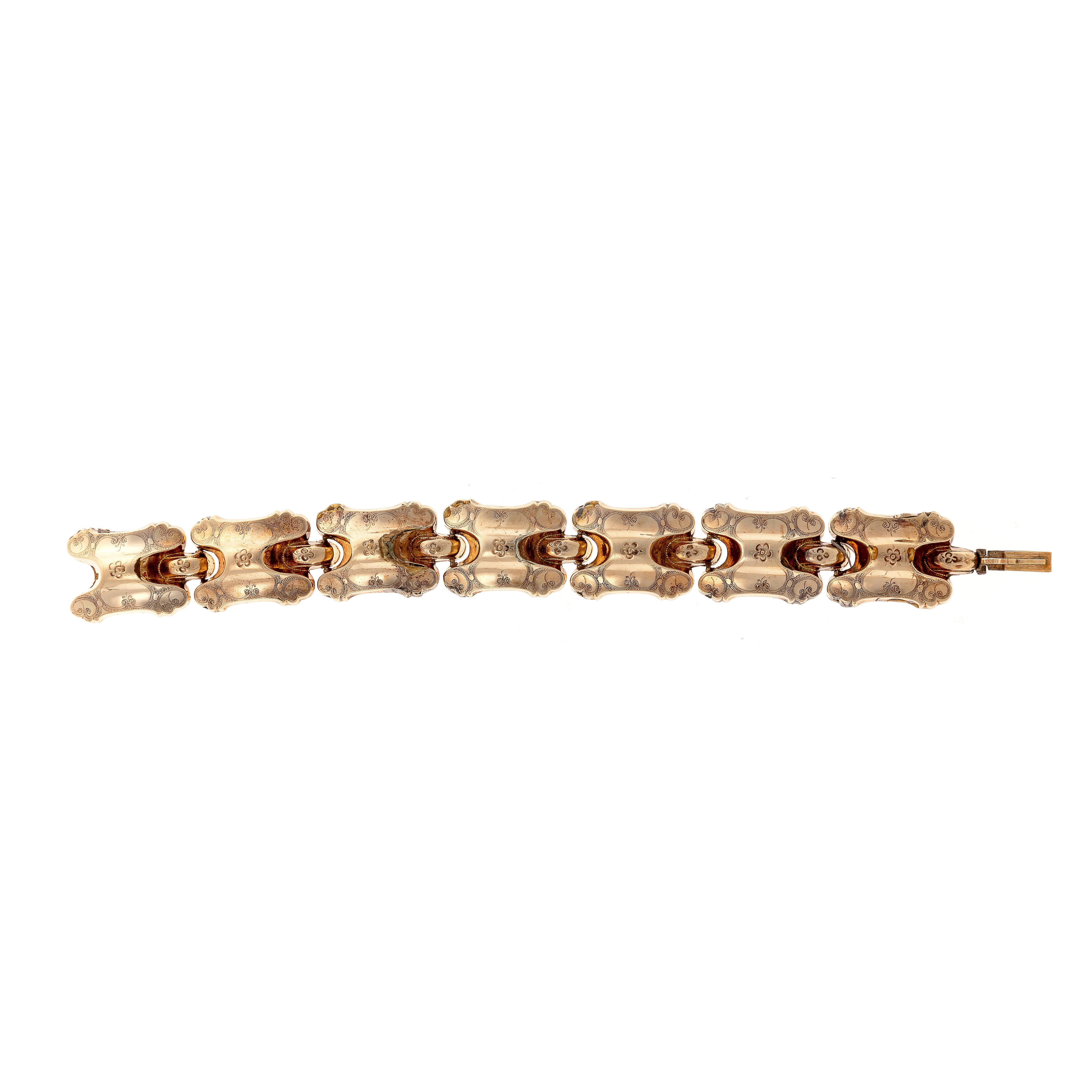 Antique Victorian gold engraved panel link bracelet in full length.
