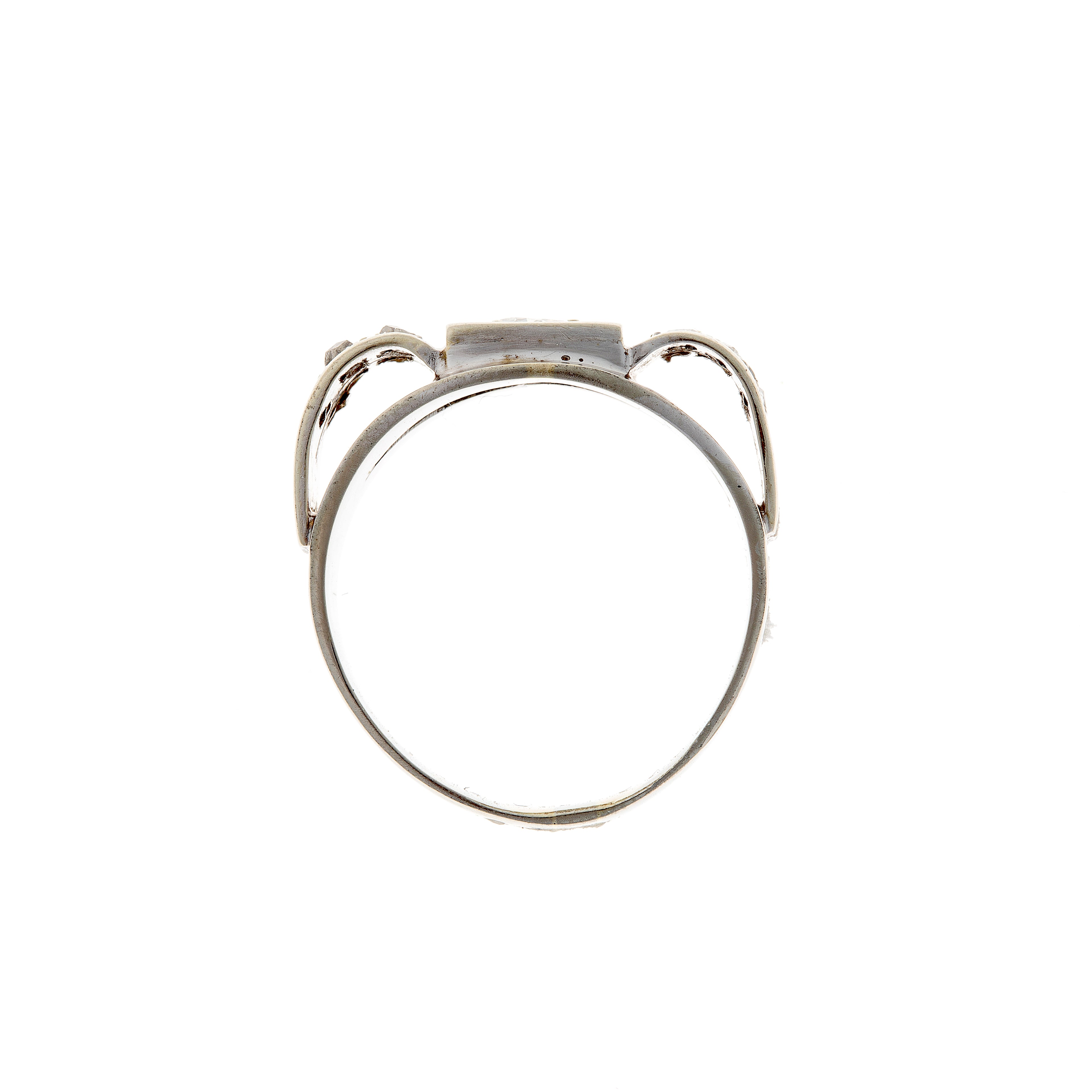 Detailed profile view of an Art Deco diamond ring’s metalwork, capturing its elegant 1920s craftsmanship.