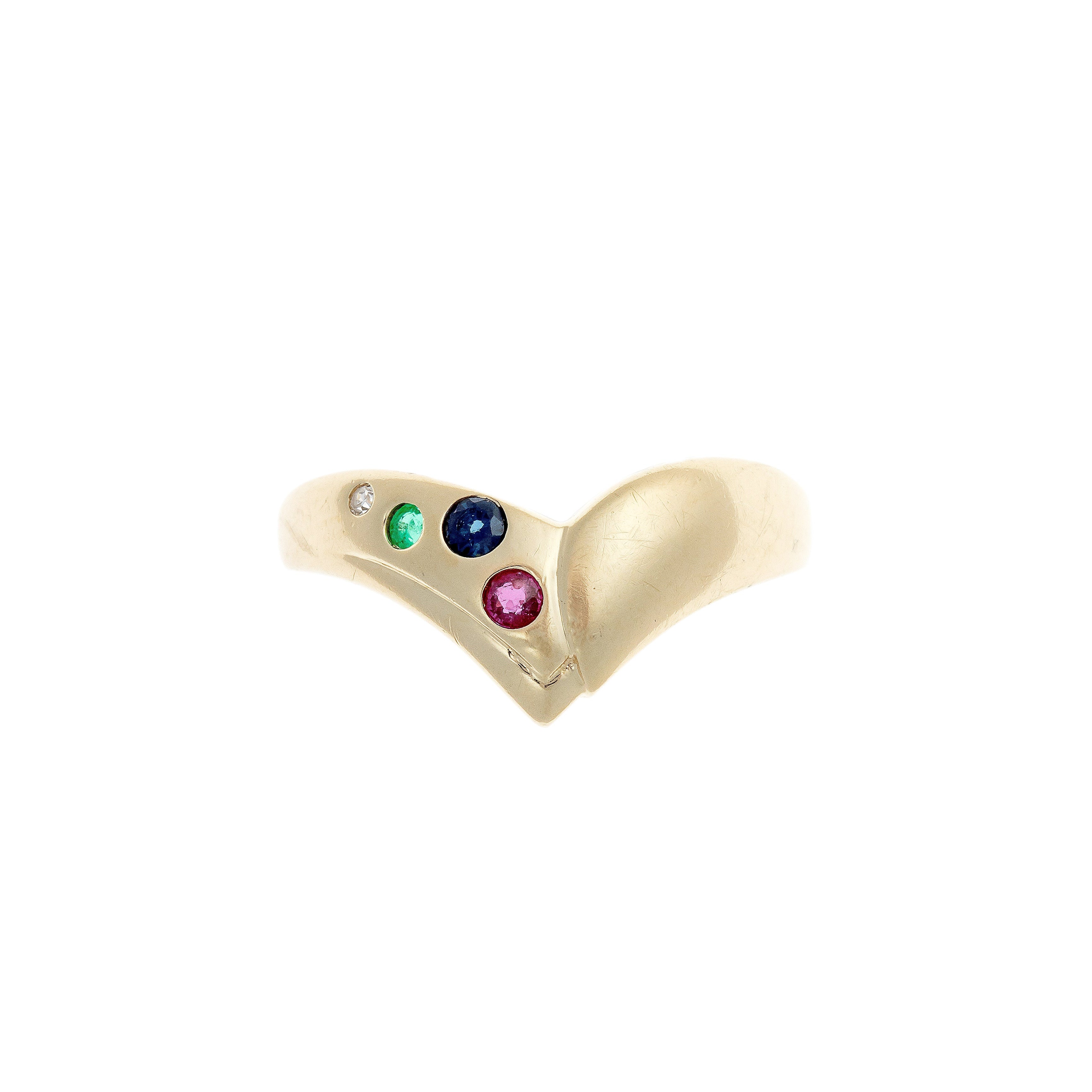 Top view of a modernist gold ring showcasing a fluid, asymmetric form with flush-set gemstones.