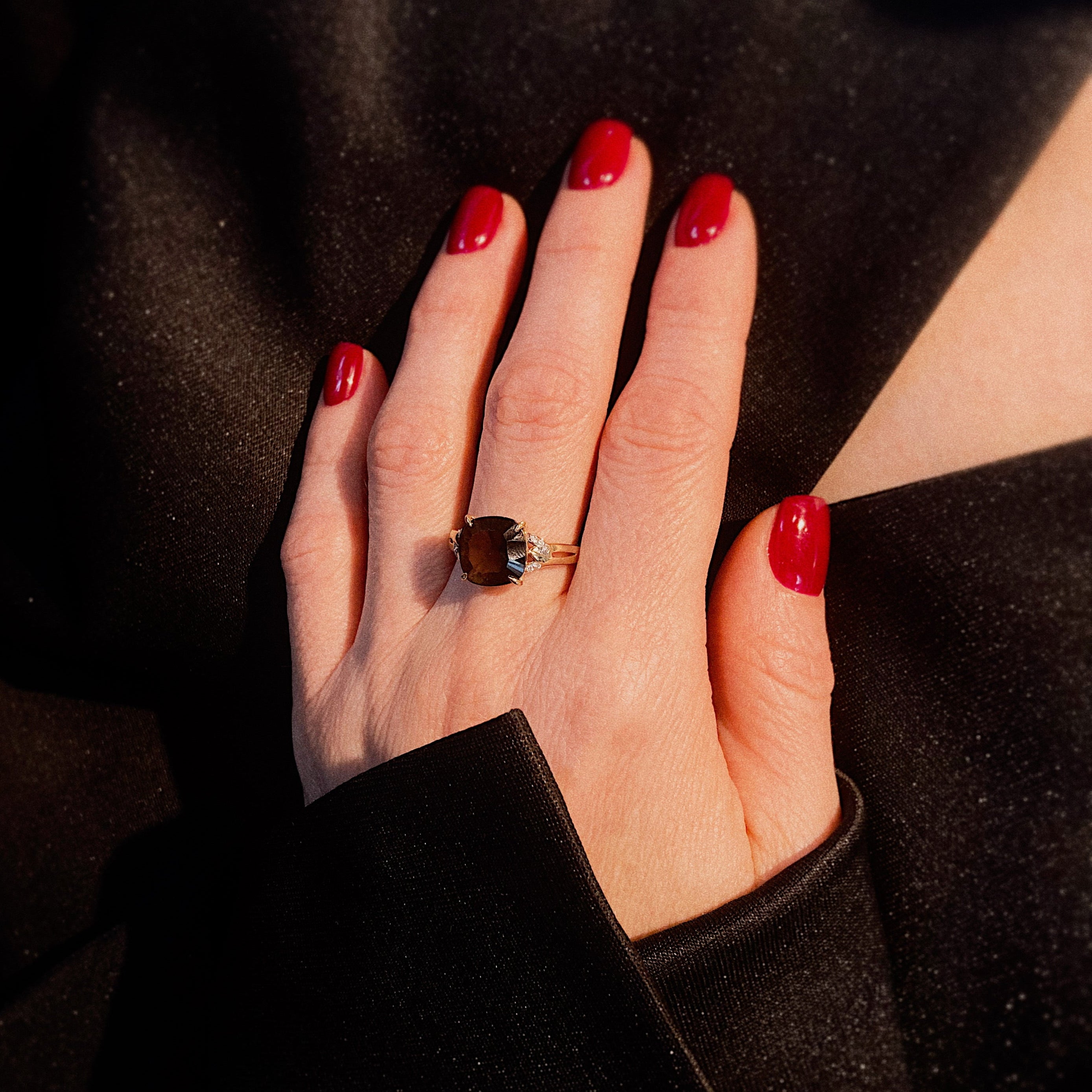 Model wearing the vintage gold smoky quartz and diamond cocktail ring.