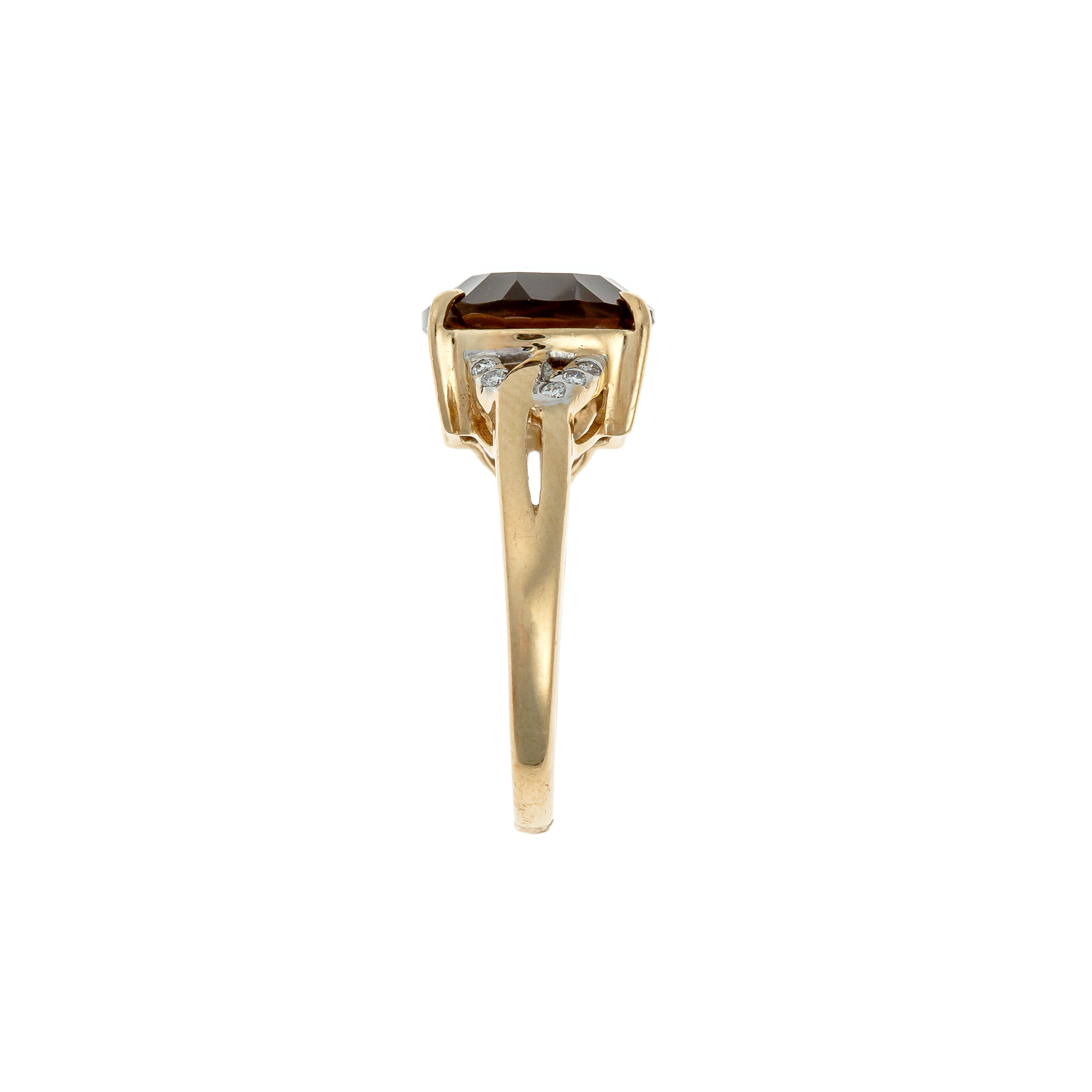 Side view of the German-made cocktail ring highlighting its curved band and sparkling diamond clusters.