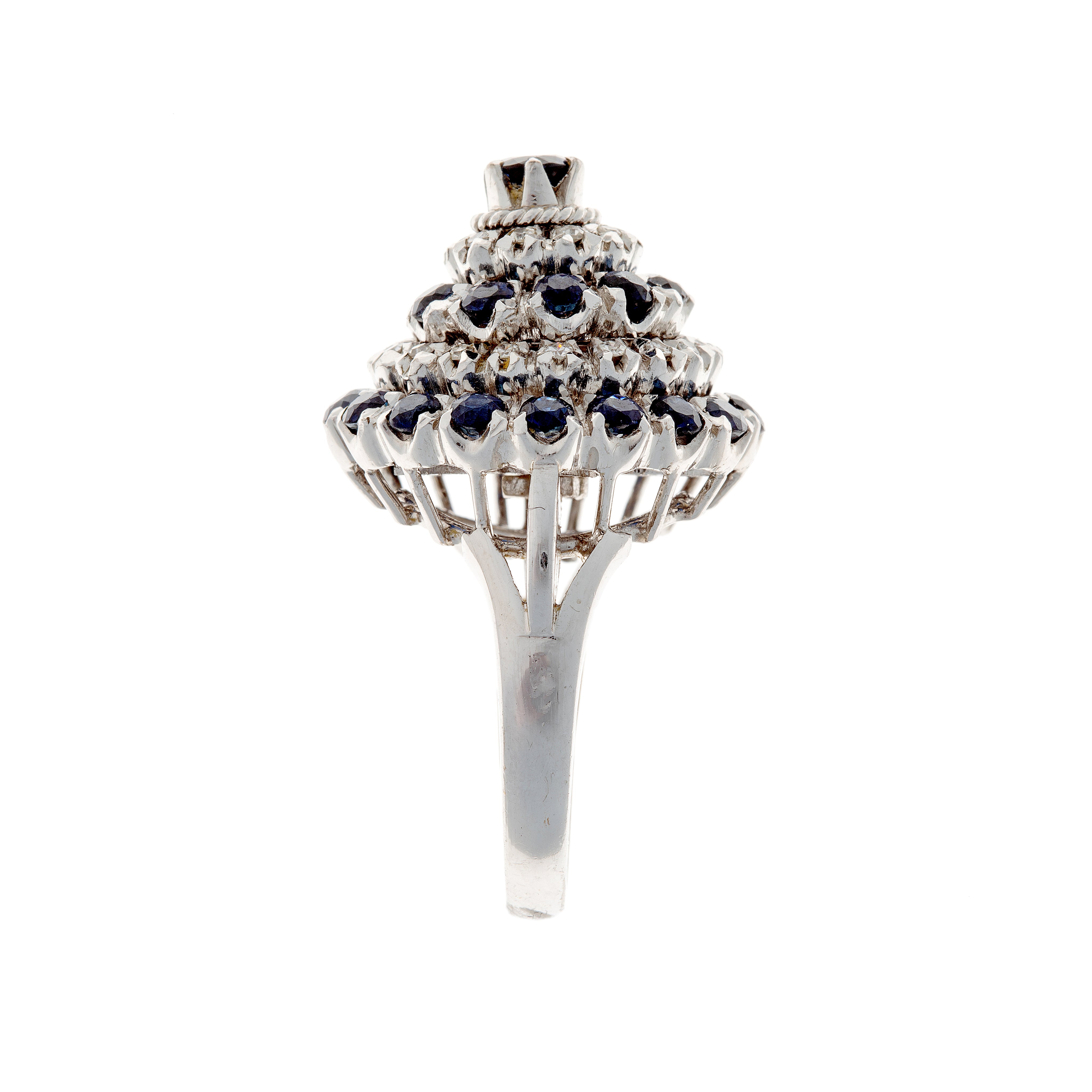 Side view of contemporary sapphire and diamond white gold ring with structured gallery.