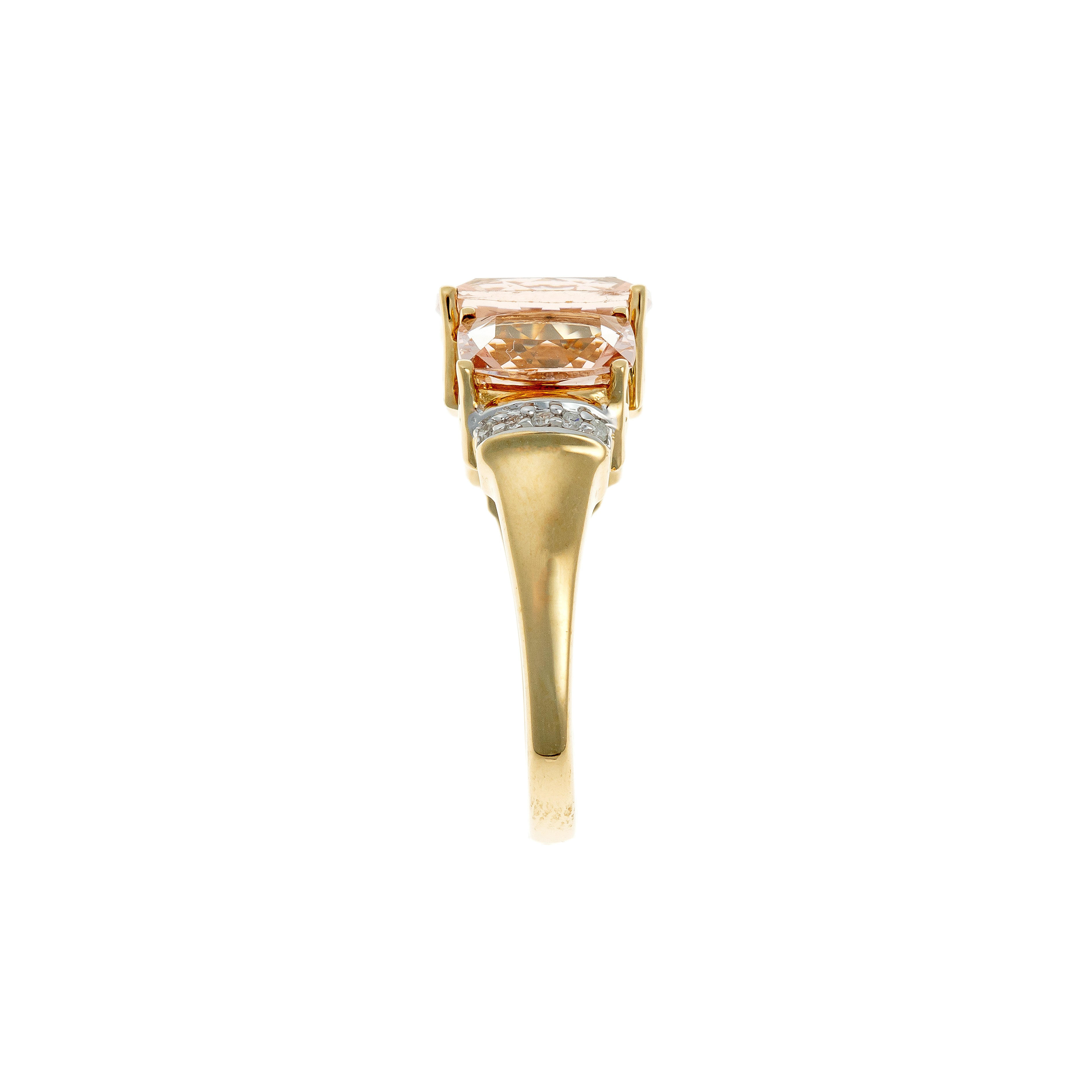 Side view of contemporary vintage French 14K gold morganite and diamond ring showcasing gemstone setting.