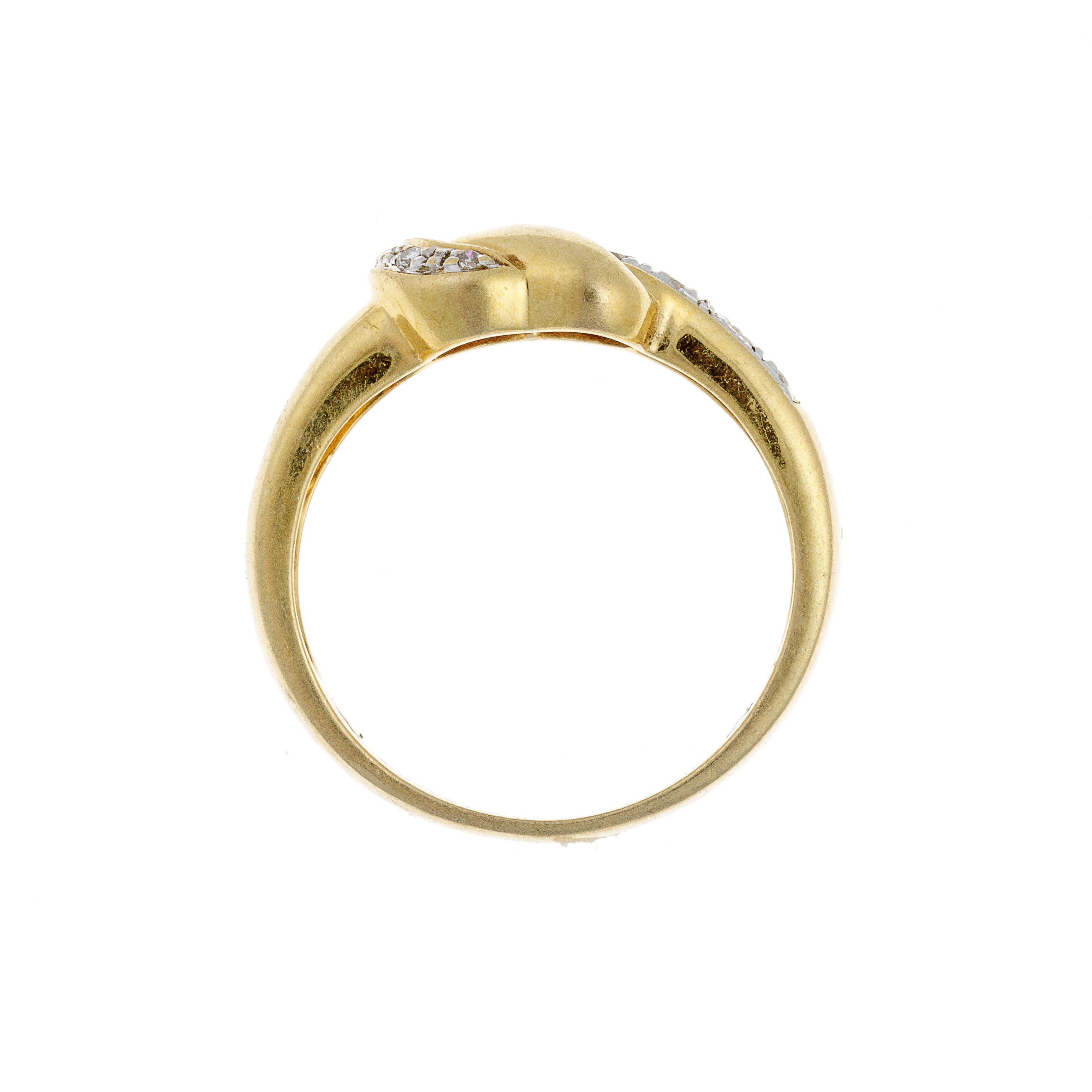 Profile view of contemporary vintage gold cocktail ring with diamonds and emeralds.