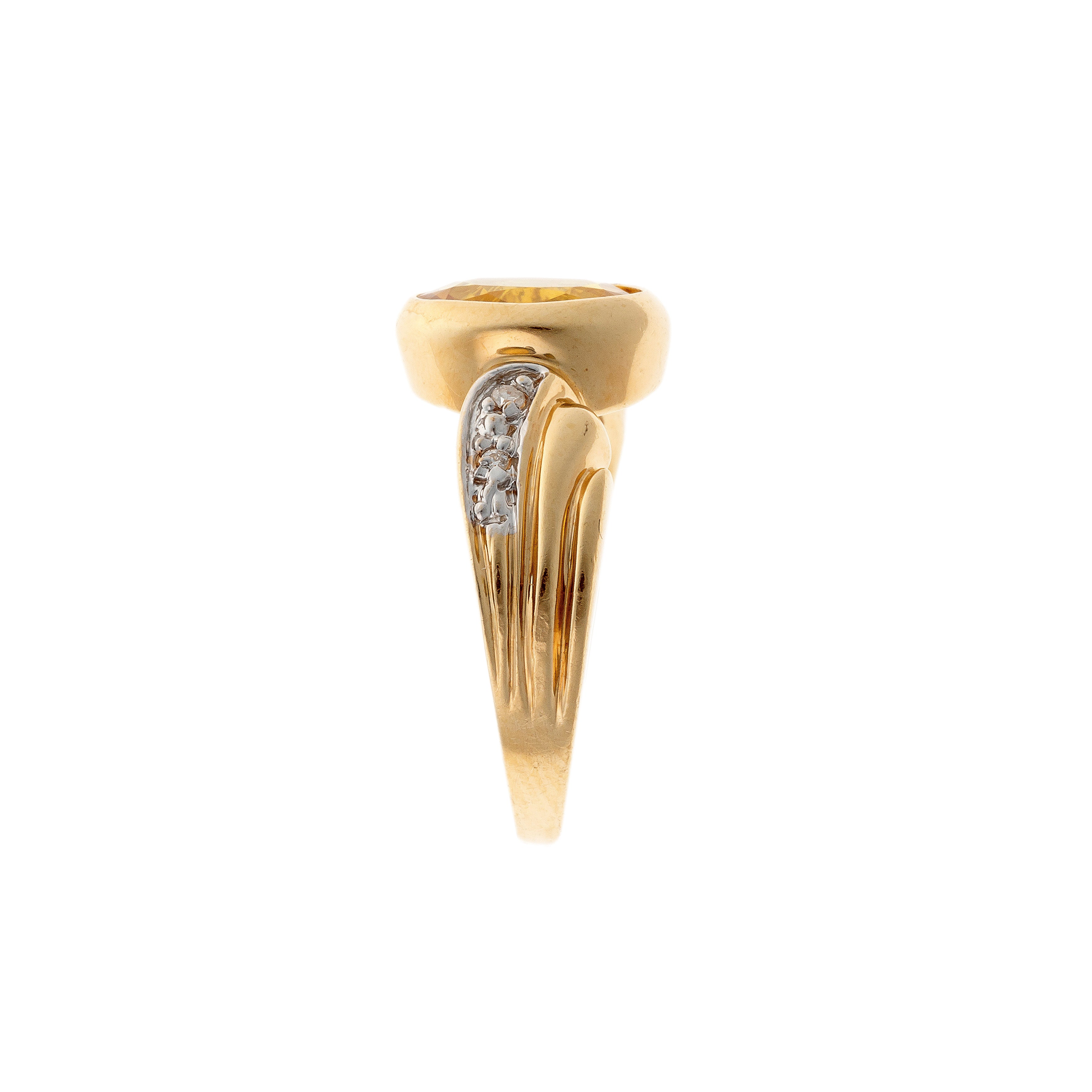 Side of the contemporary vintage yellow gold yellow sapphire and diamond cocktail ring.