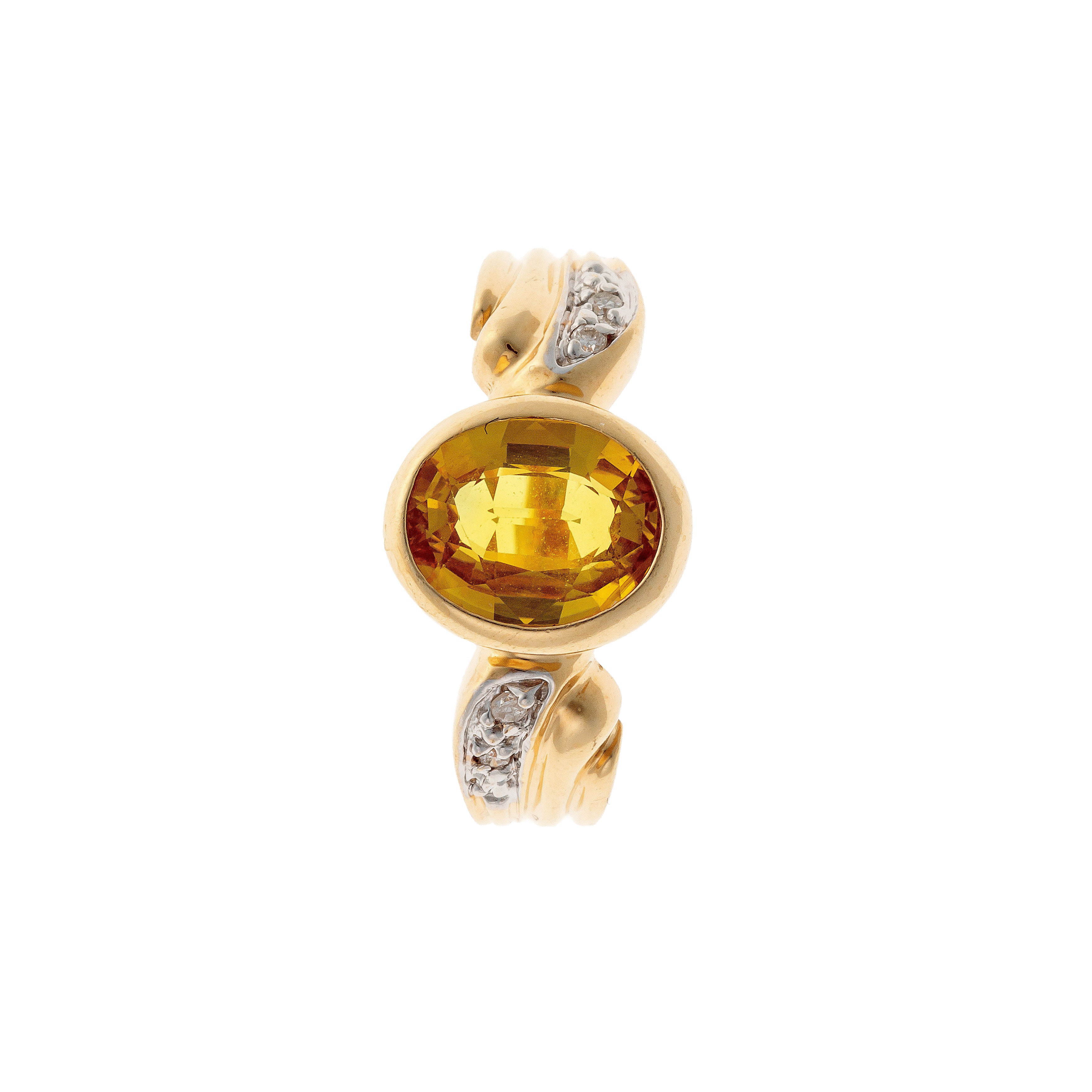 Top of the contemporary vintage yellow gold yellow sapphire and diamond cocktail ring.