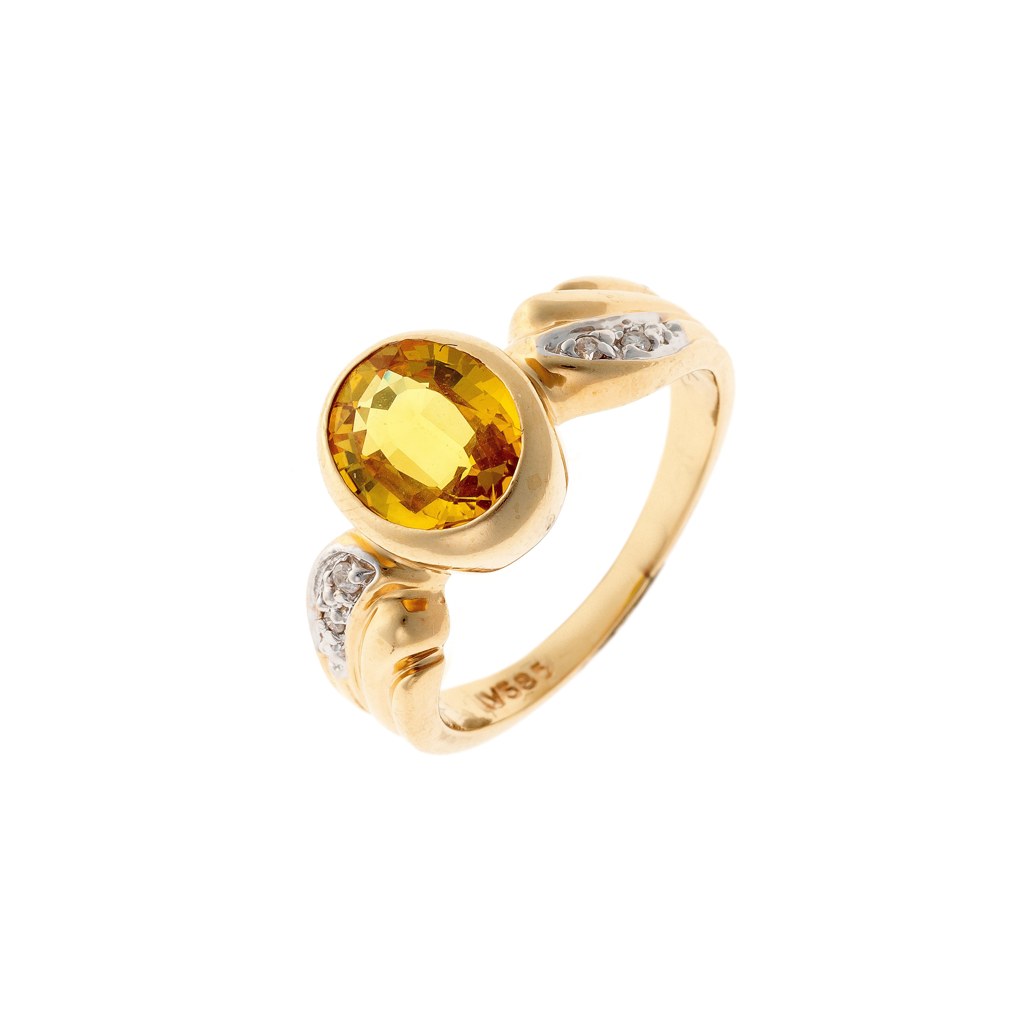 Contemporary vintage yellow gold yellow sapphire and diamond cocktail ring.
