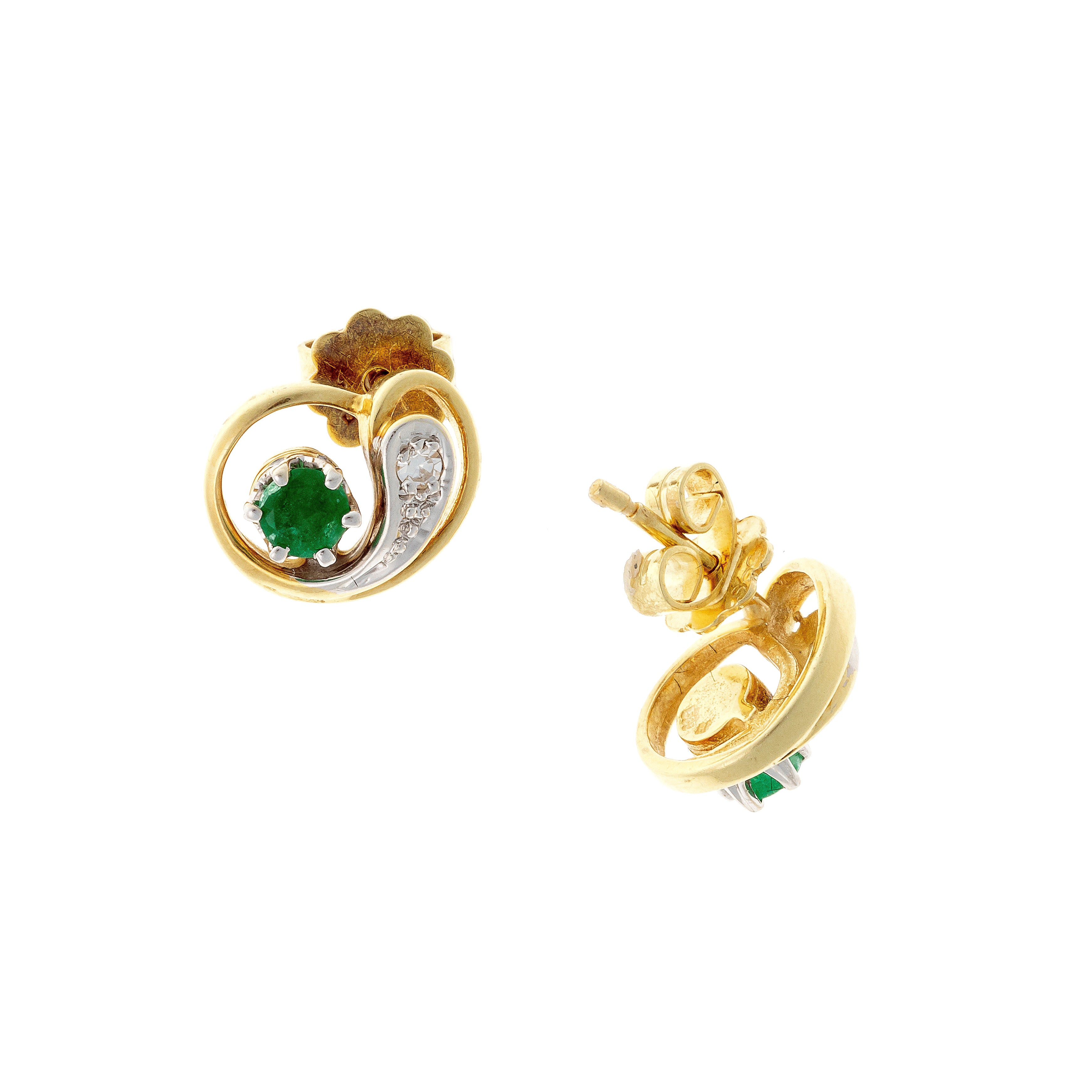 Front and back view of the vintage two-tone gold emerald and diamond swirl stud earrings.