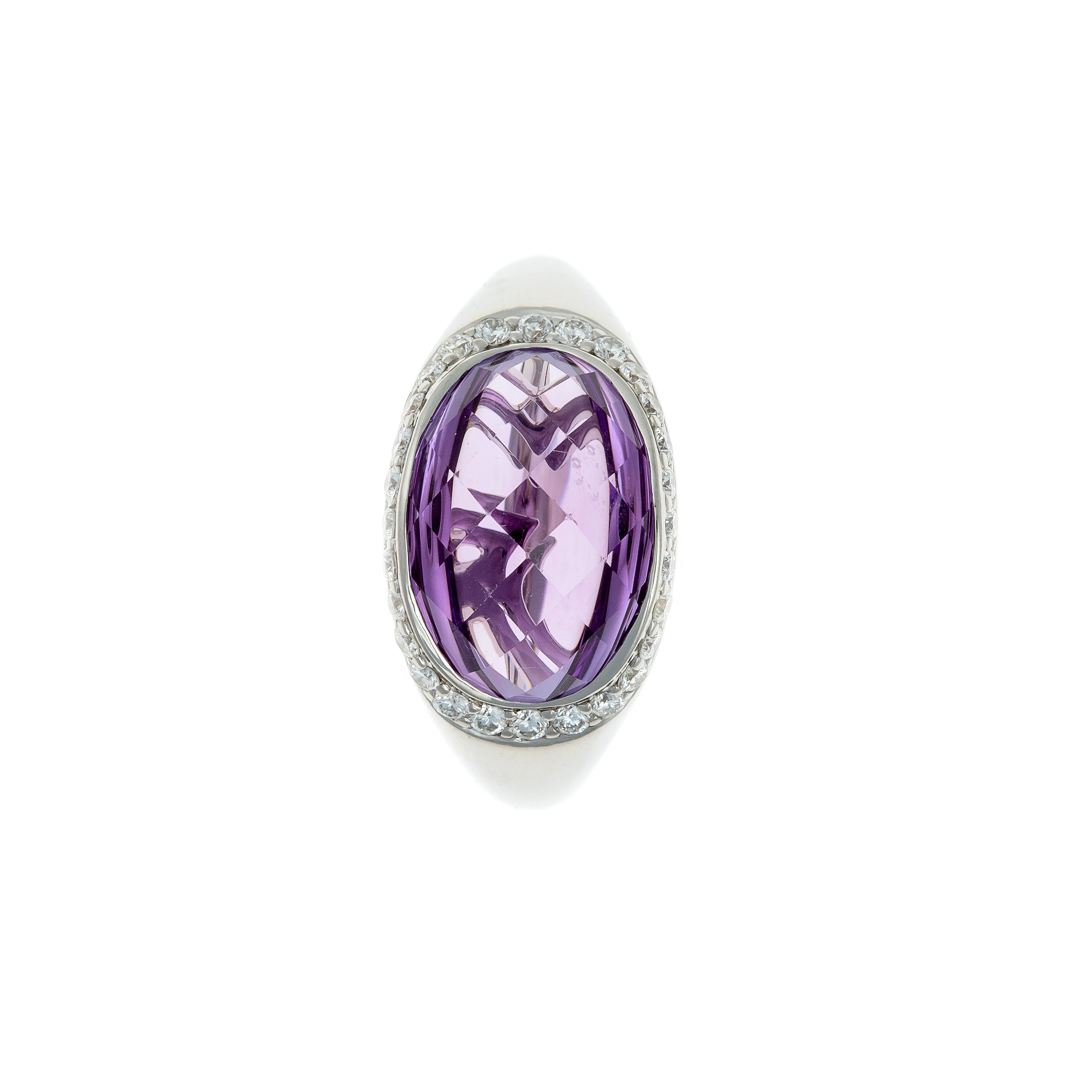 Top view of white gold cocktail ring with oval amethyst and diamond halo.