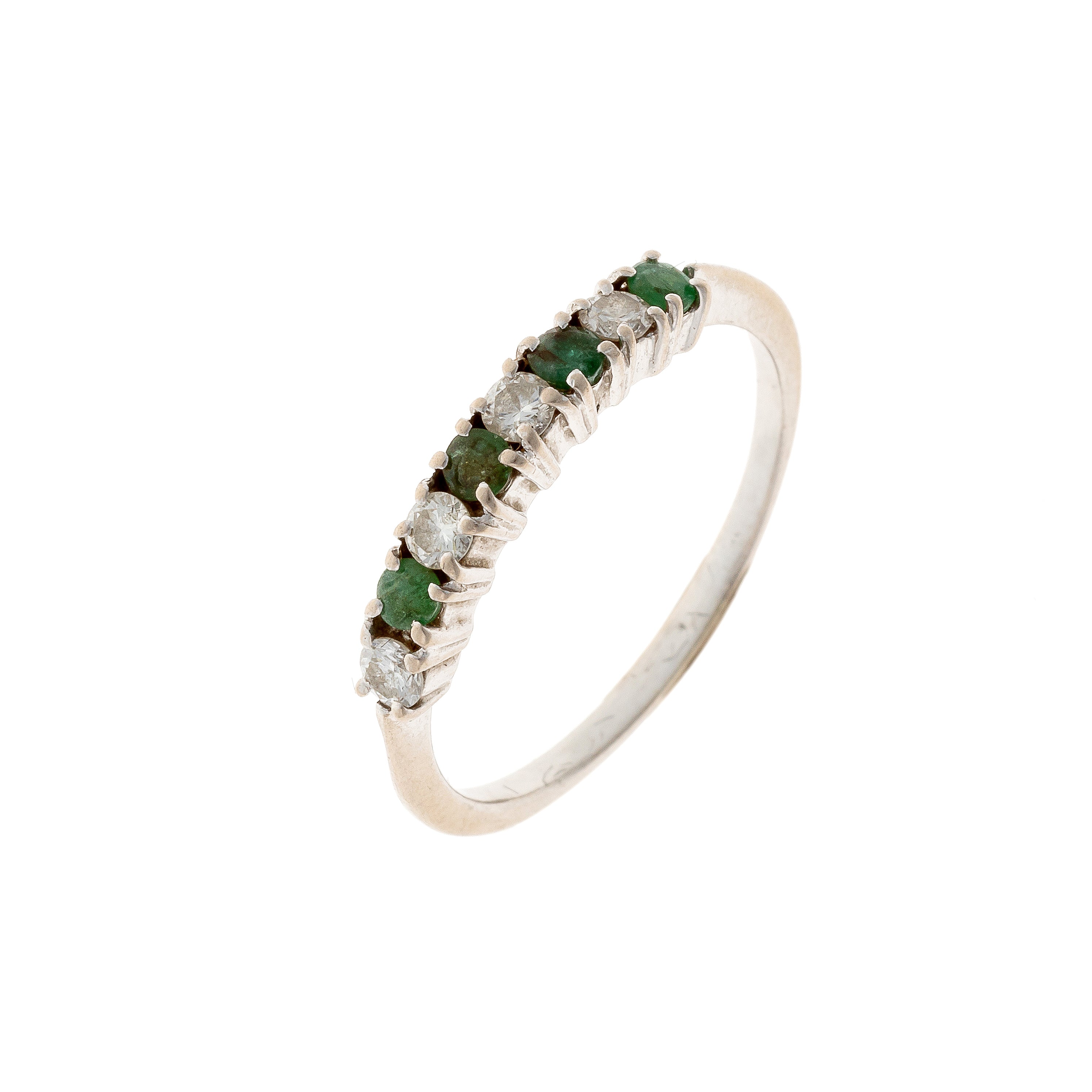 Contemporary vintage white gold emerald and diamond band ring.