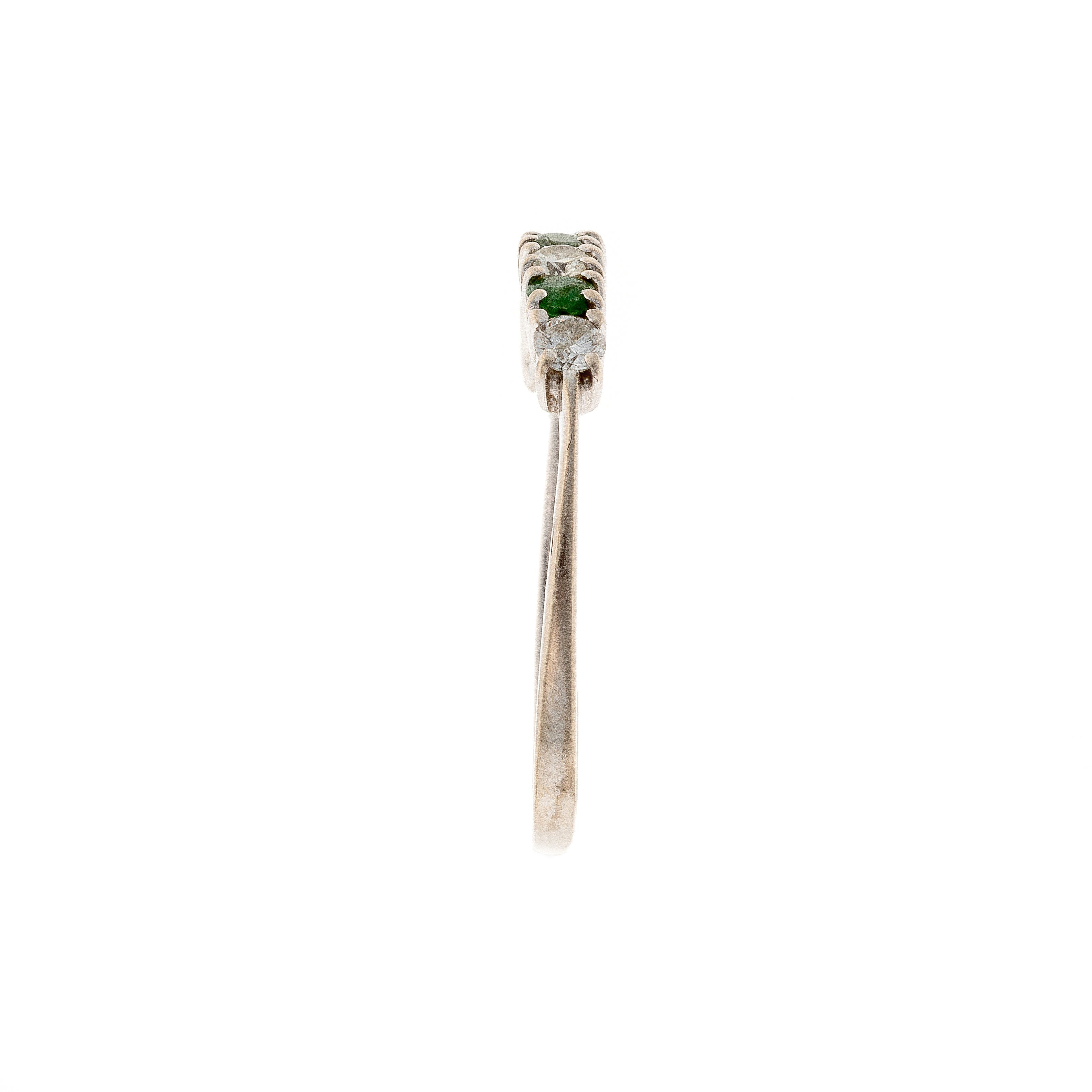 Side of the contemporary vintage white gold emerald and diamond band ring.