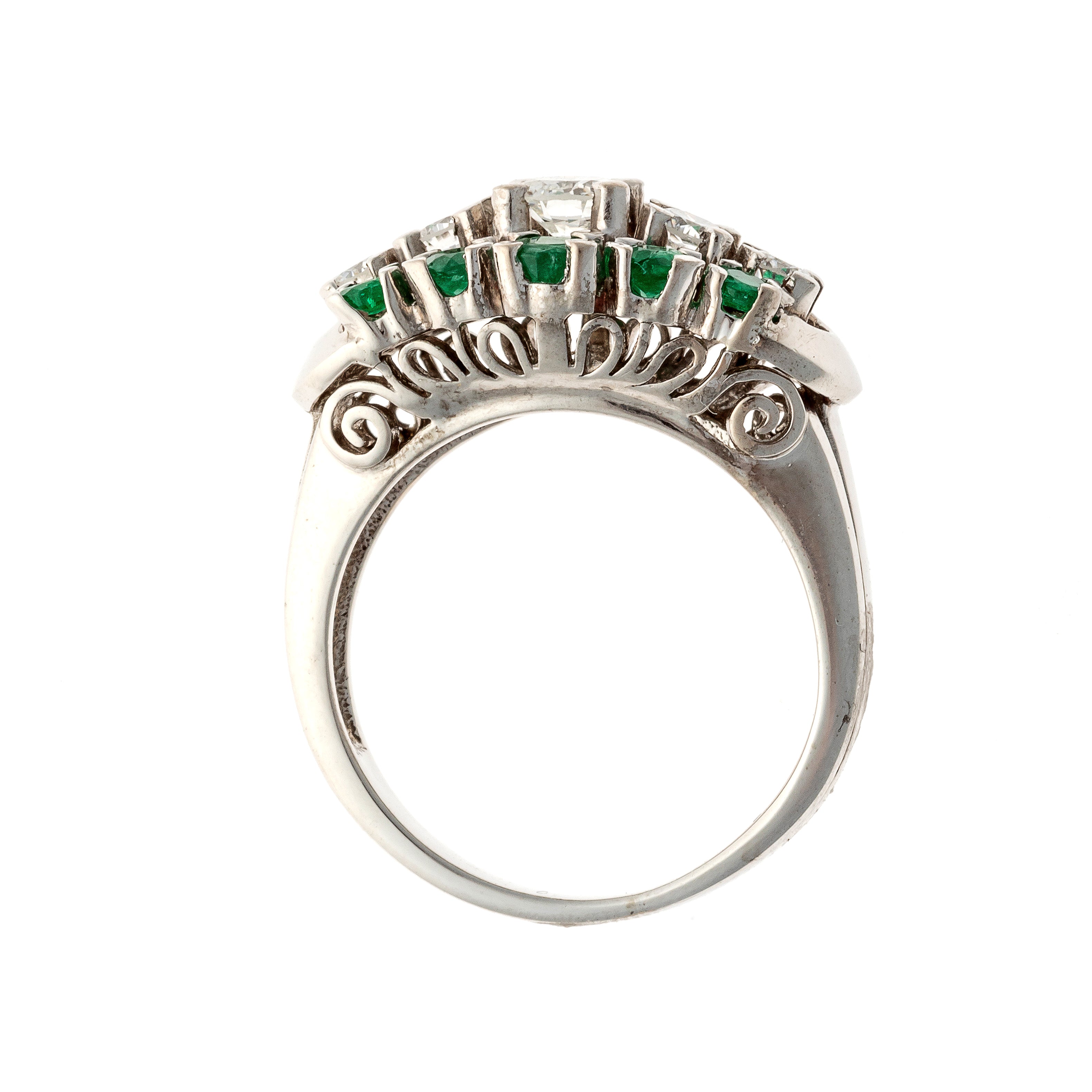 Profile of the vintage white gold emerald and diamond cocktail ring.