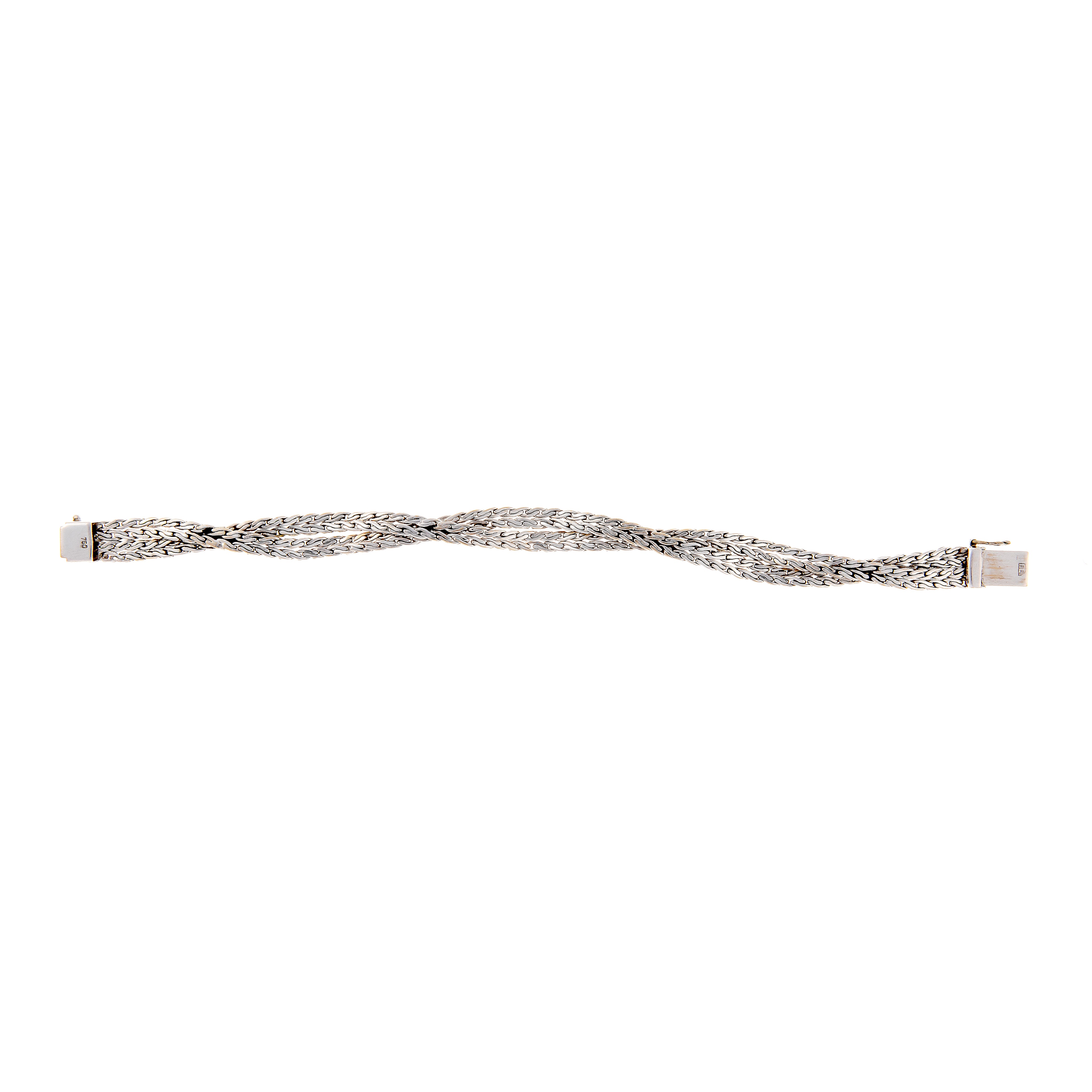 Back side of the retro revival vintage white gold bracelet with woven design and round sapphires.