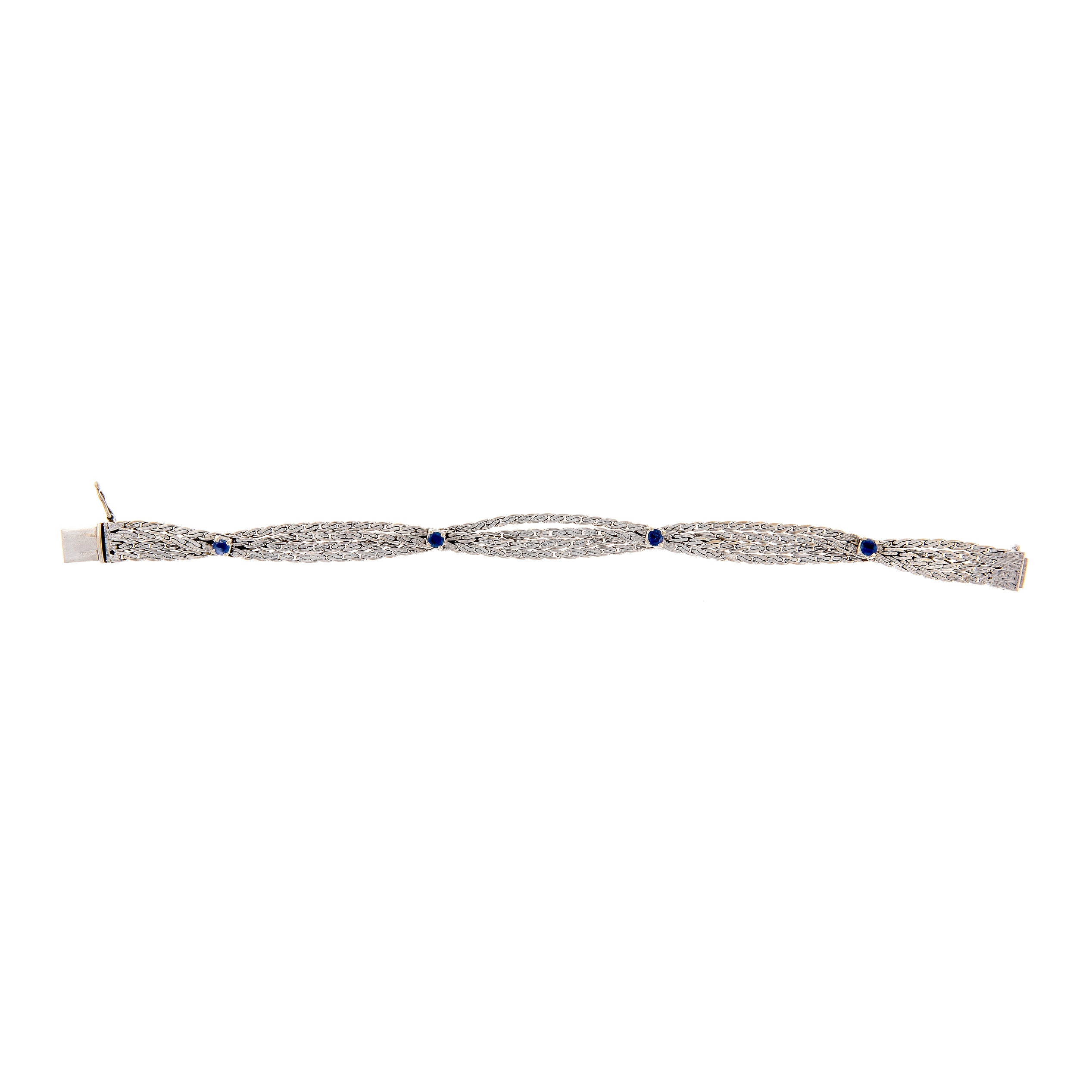 Front side of the retro revival vintage white gold bracelet with woven design and round sapphires.
