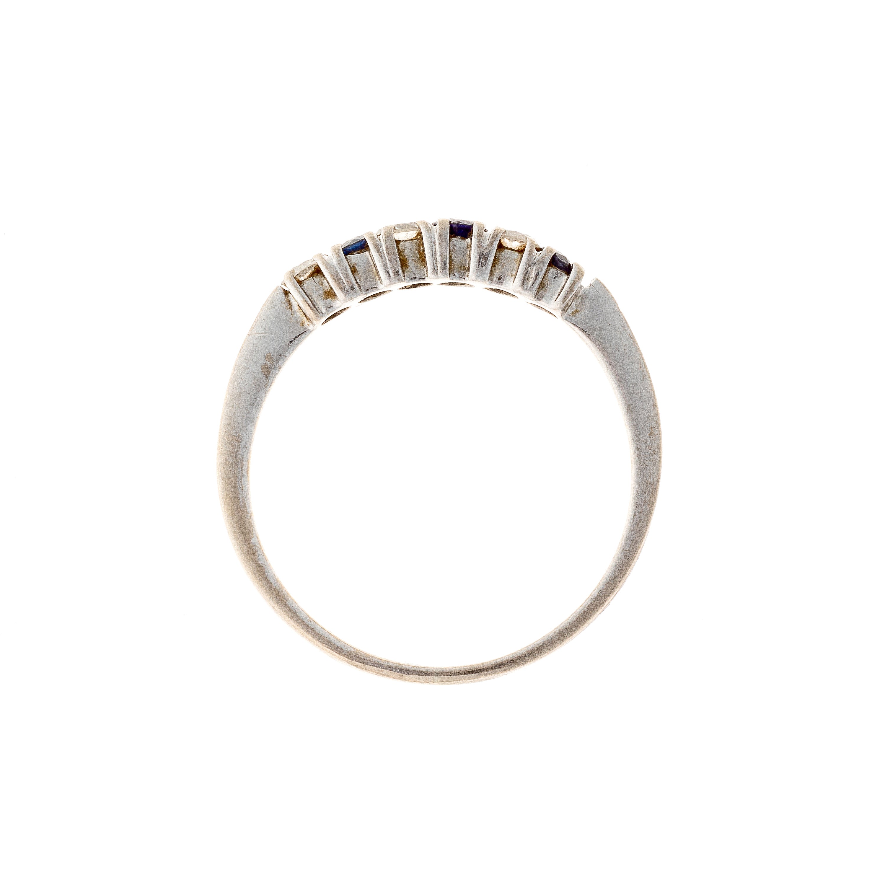 Profile of the contemporary vintage white gold sapphire and diamond band ring.