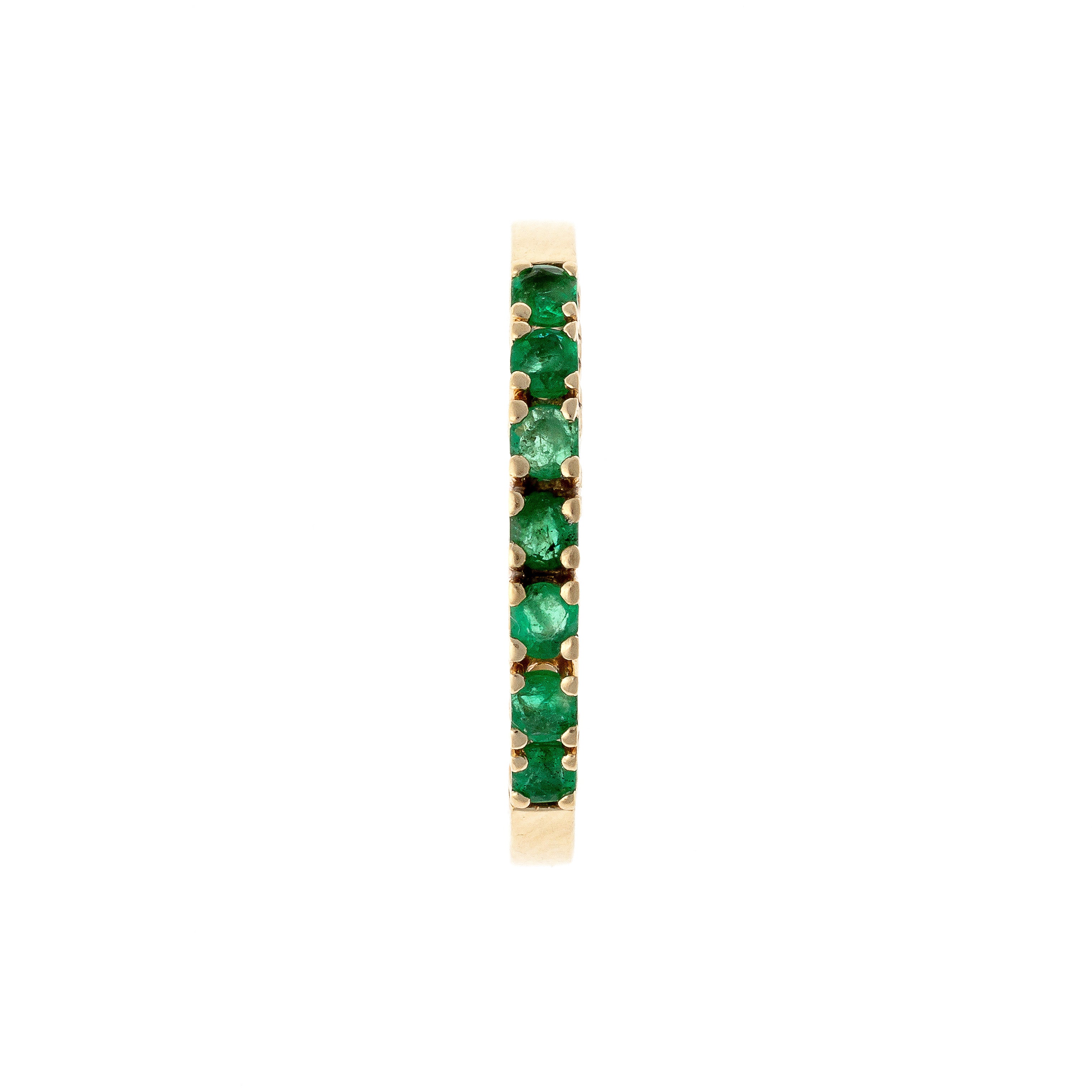 Top of the Contemporary vintage yellow gold emerald band ring.