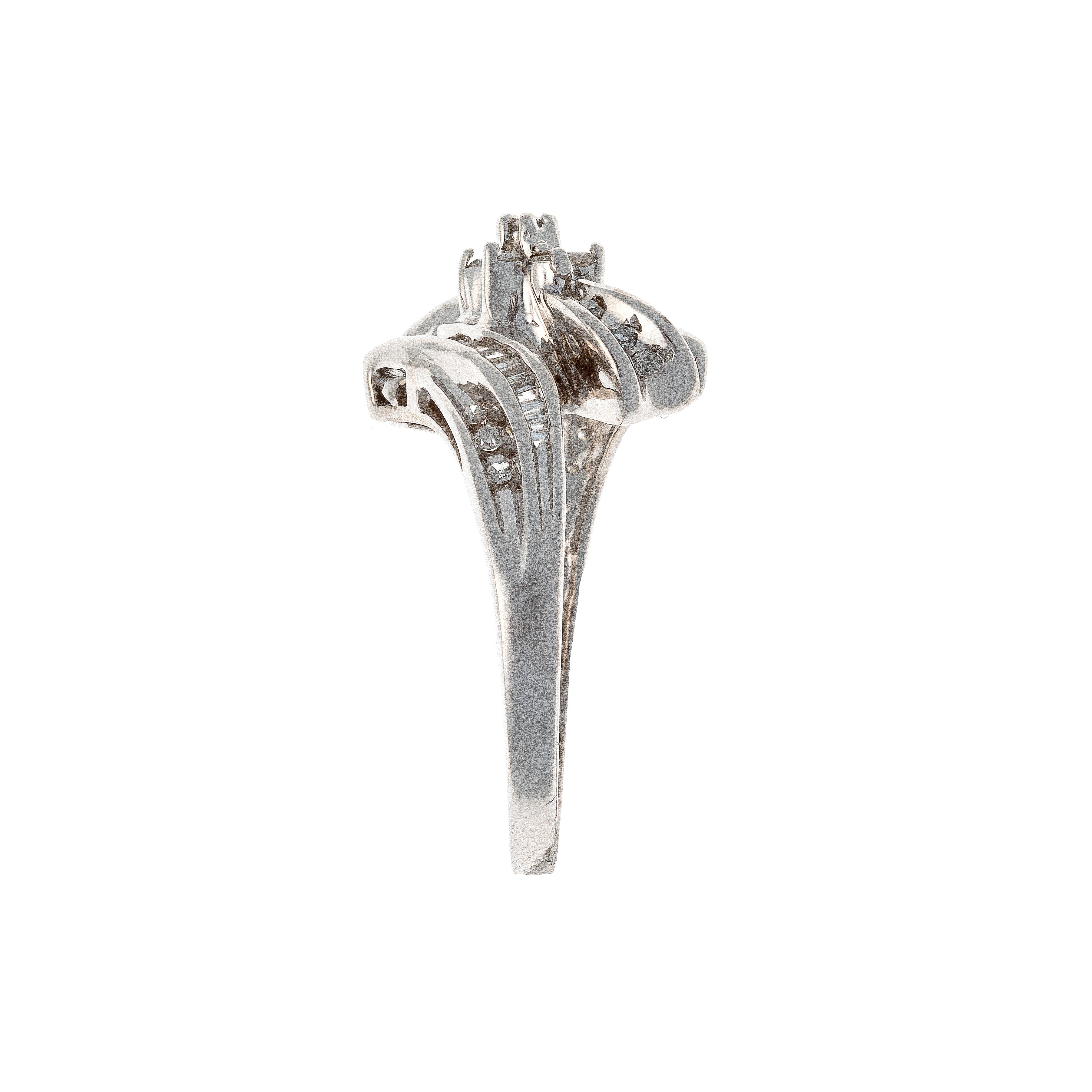 Side of the Contemporary vintage white gold mixed-cut diamond bypass ring.