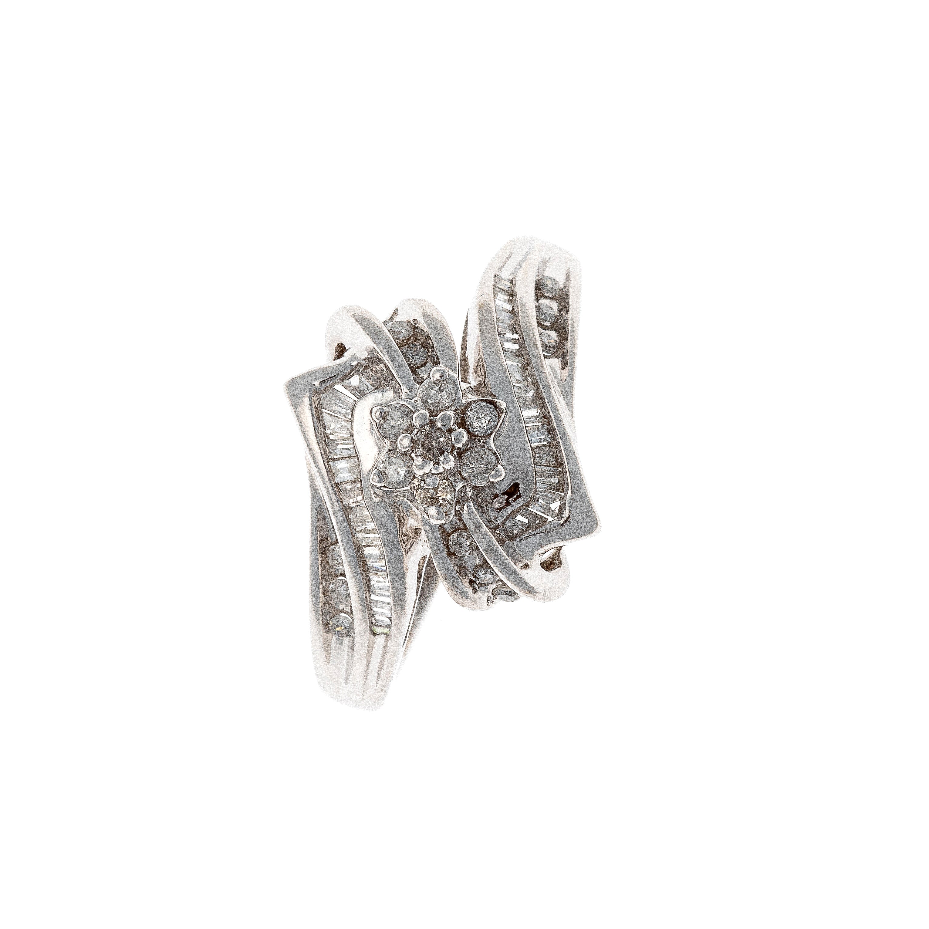 Top of the Contemporary vintage white gold mixed-cut diamond bypass ring.
