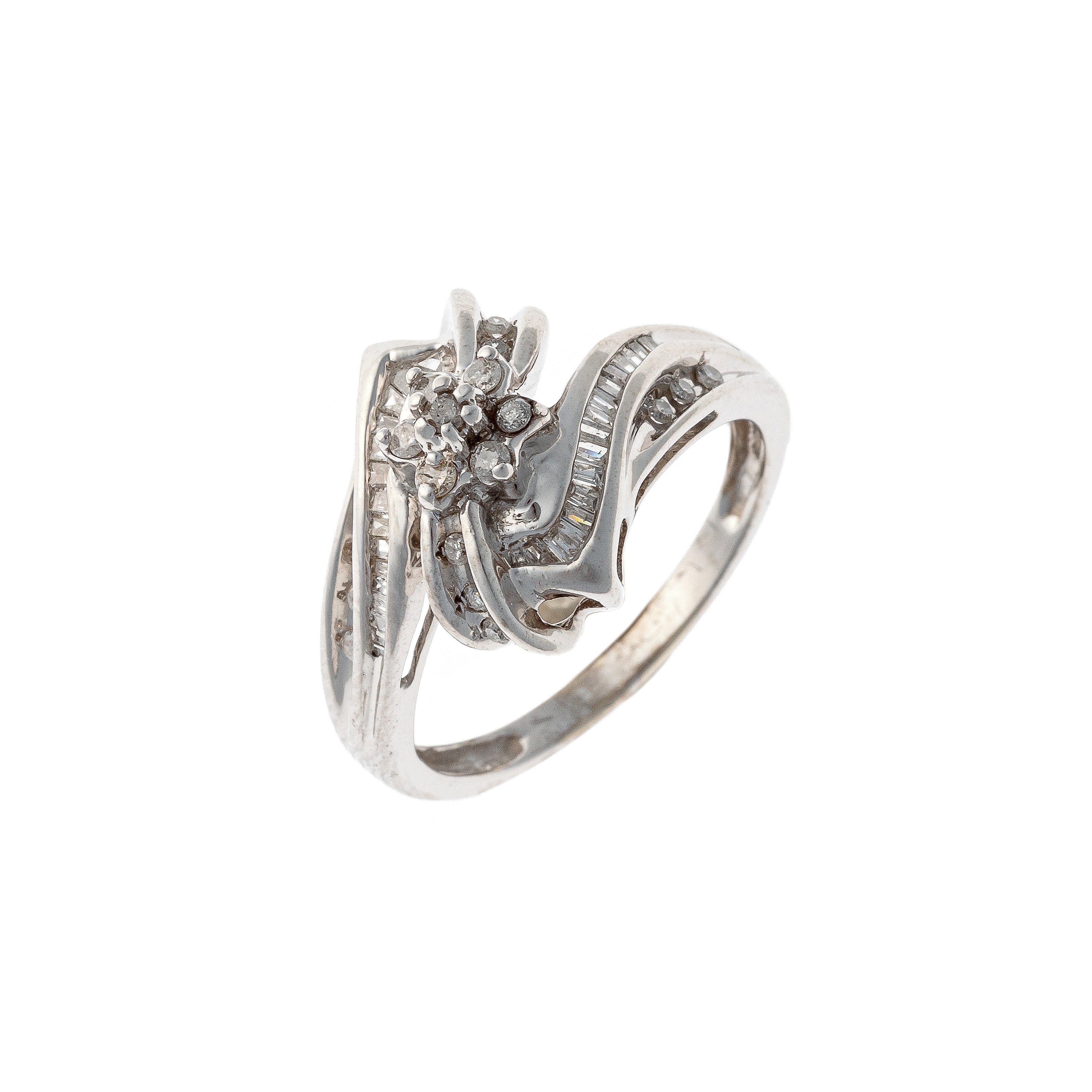 Contemporary vintage white gold mixed-cut diamond bypass ring.