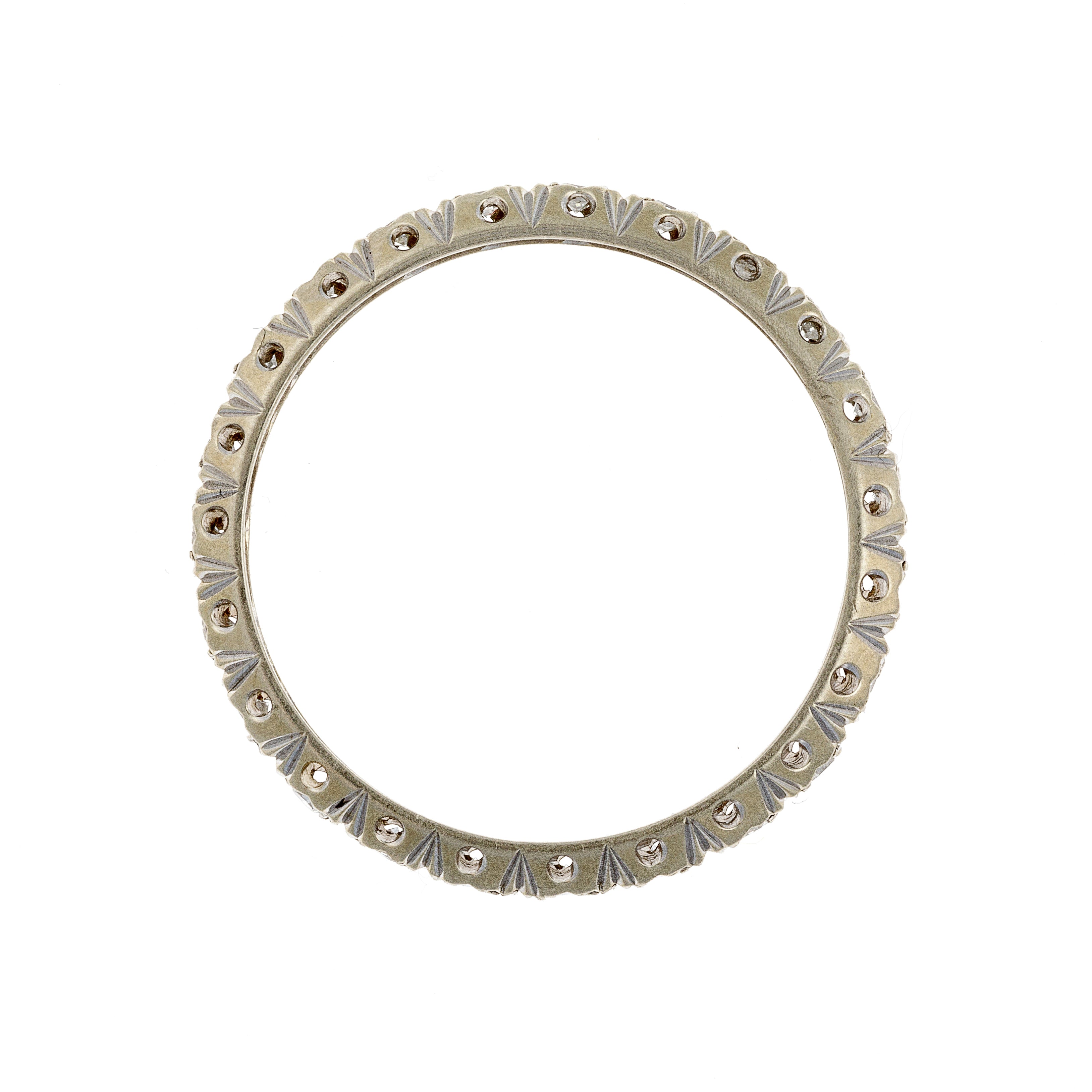 Side profile of eternity ring showing diamond alignment and slim gold band.