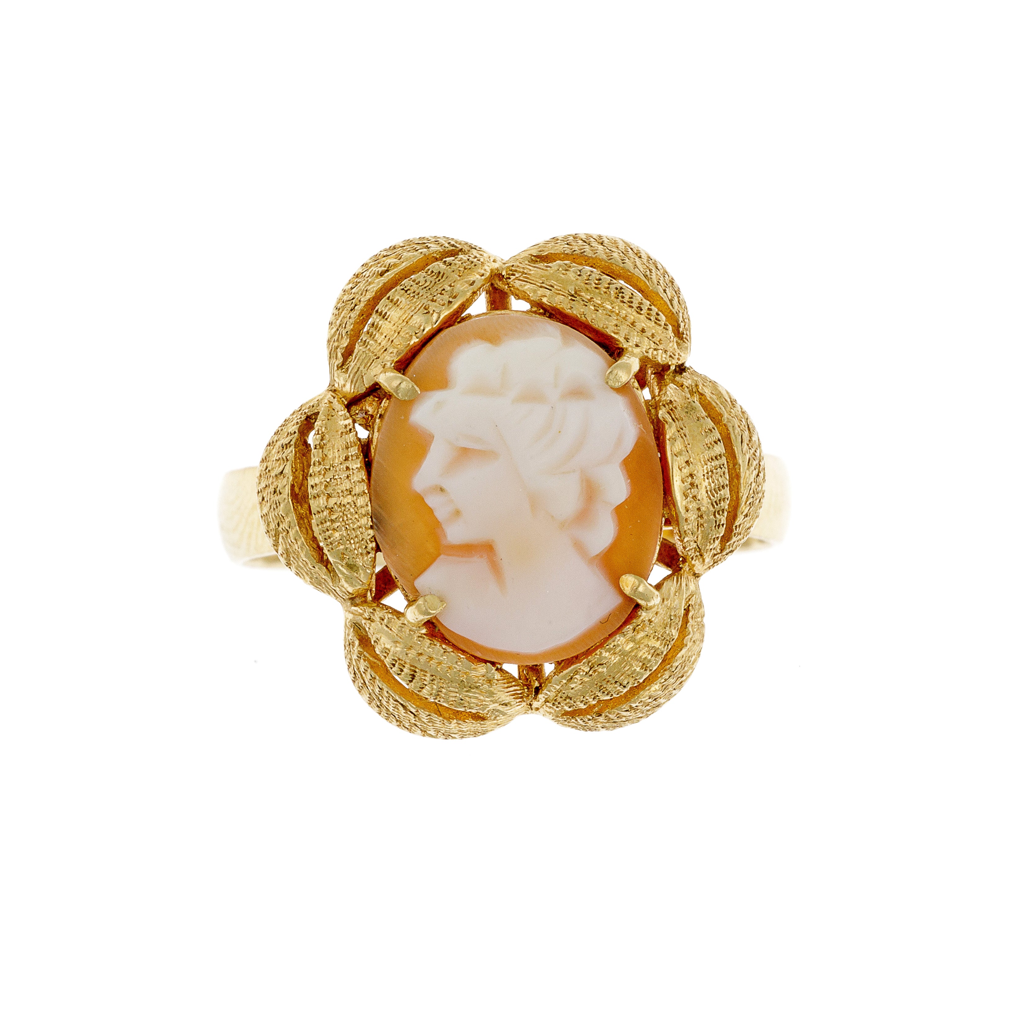 Front view of Edwardian gold ring with carved shell cameo and textured frame.