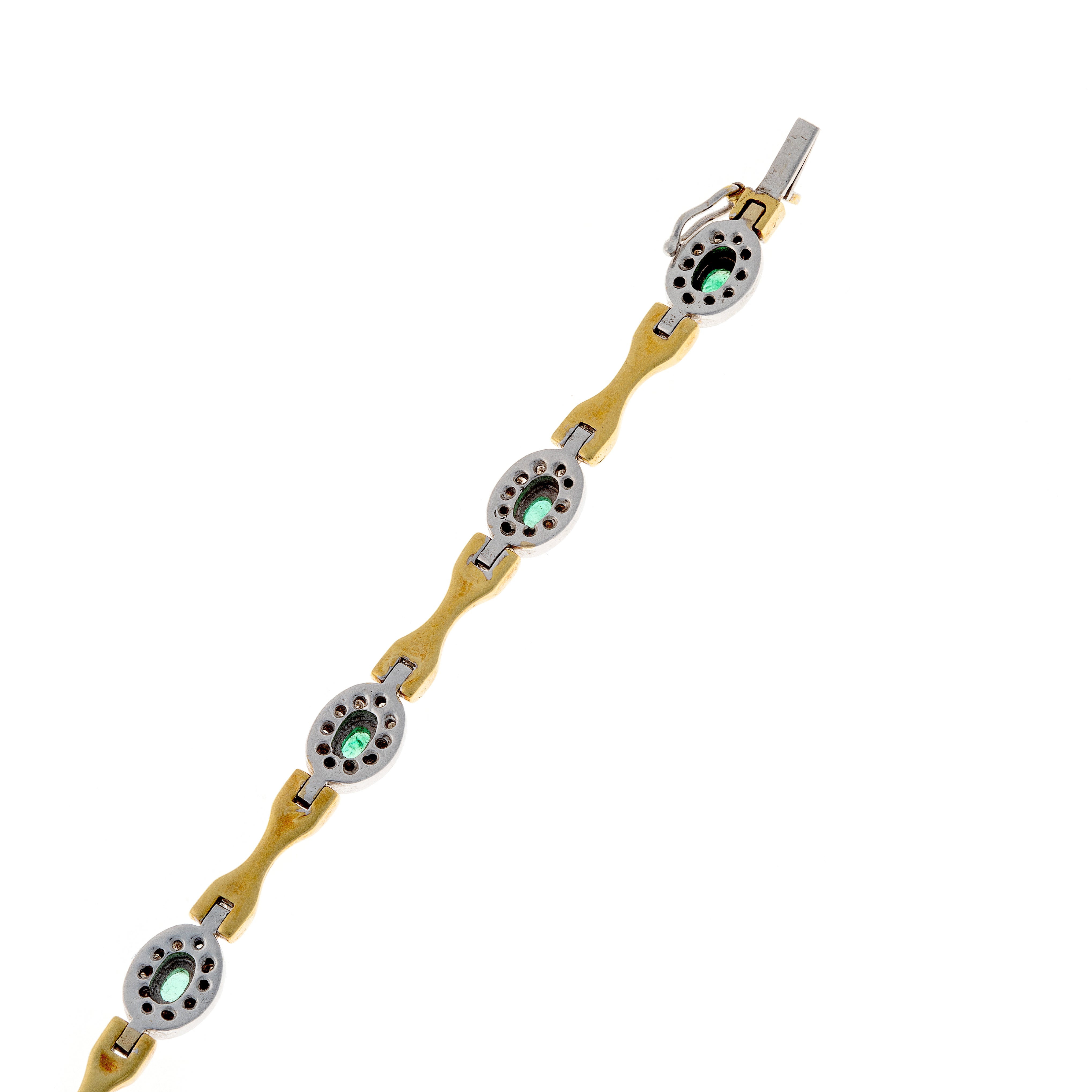 Estate gold bracelet featuring oval emerald cabochons and delicate diamond frames
