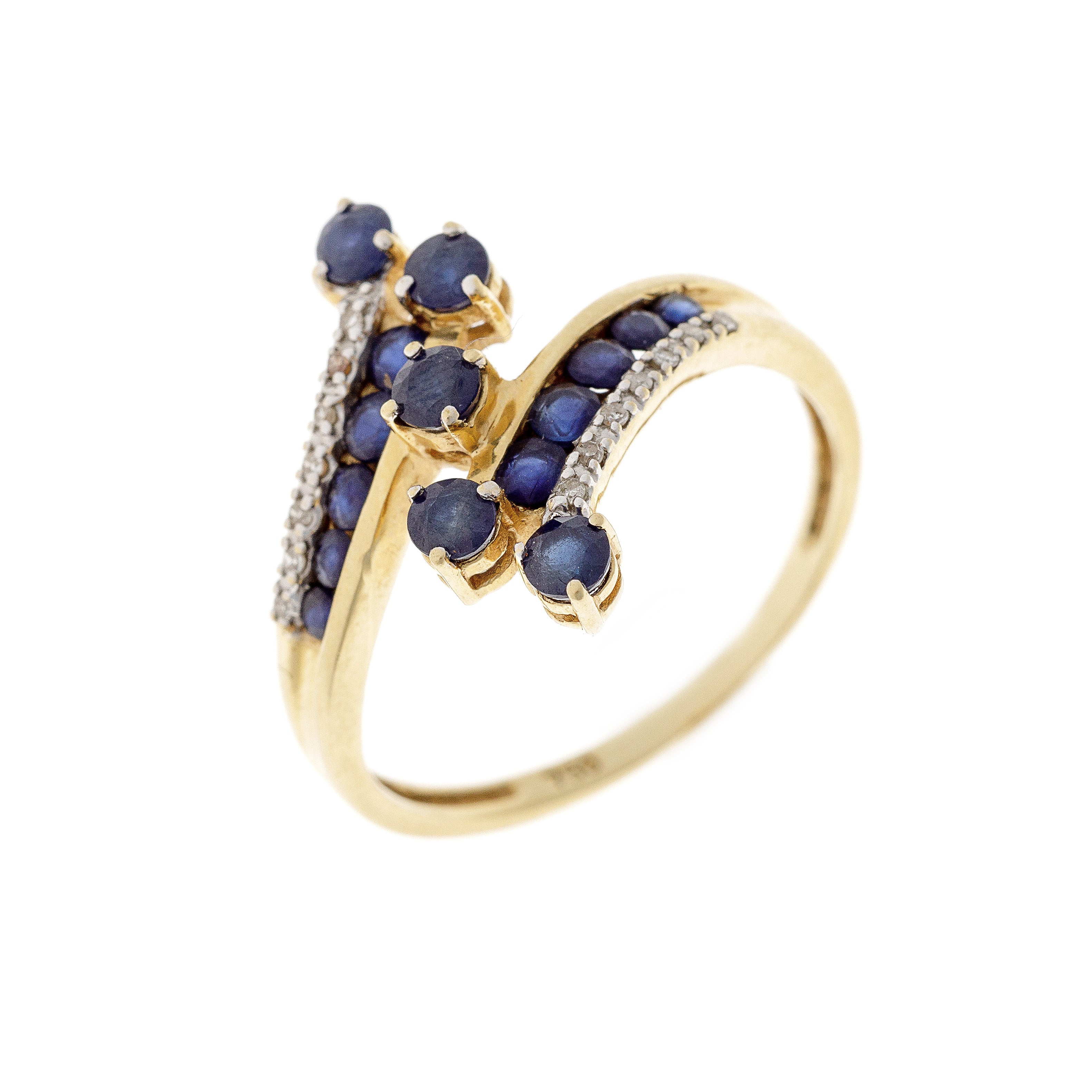 Side view of the estate sapphire and diamond bypass ring, showcasing the curved gold band and cascading gemstones.