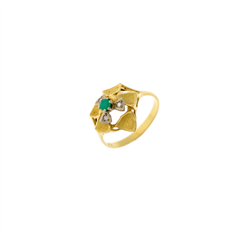 Angled view of a gold floral ring with a striking green chalcedony, encircled by textured gold petals.