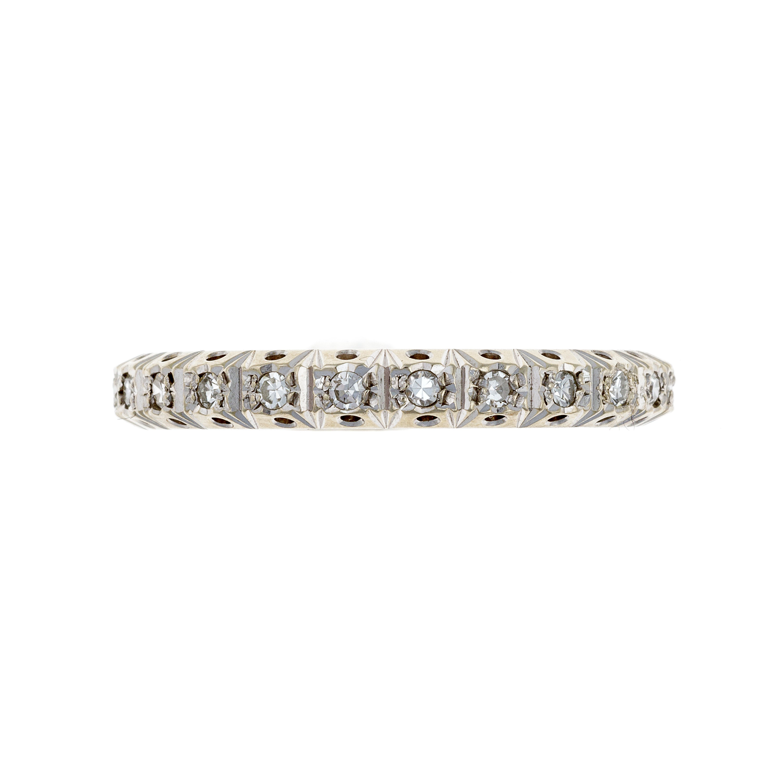 Top view of white gold eternity ring with 23 brilliant-cut diamonds in seamless design.