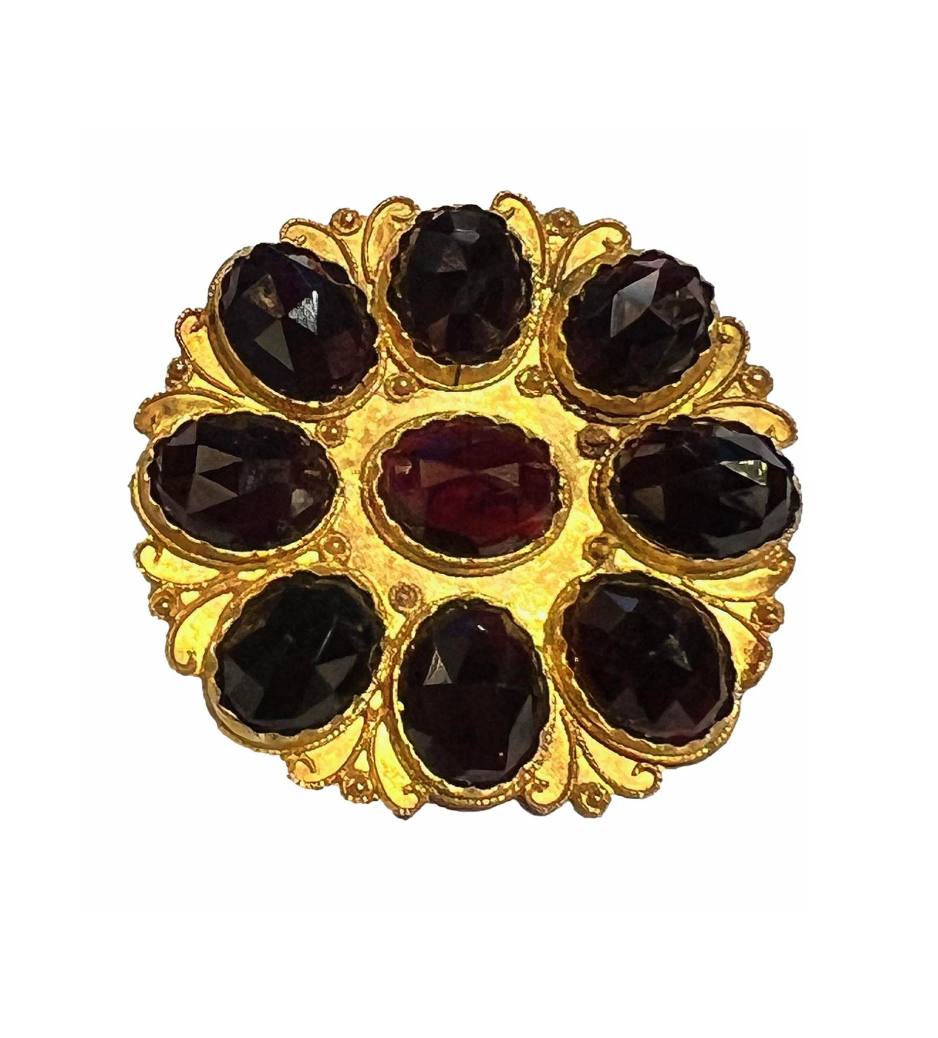 Gold Brooch with Garnets