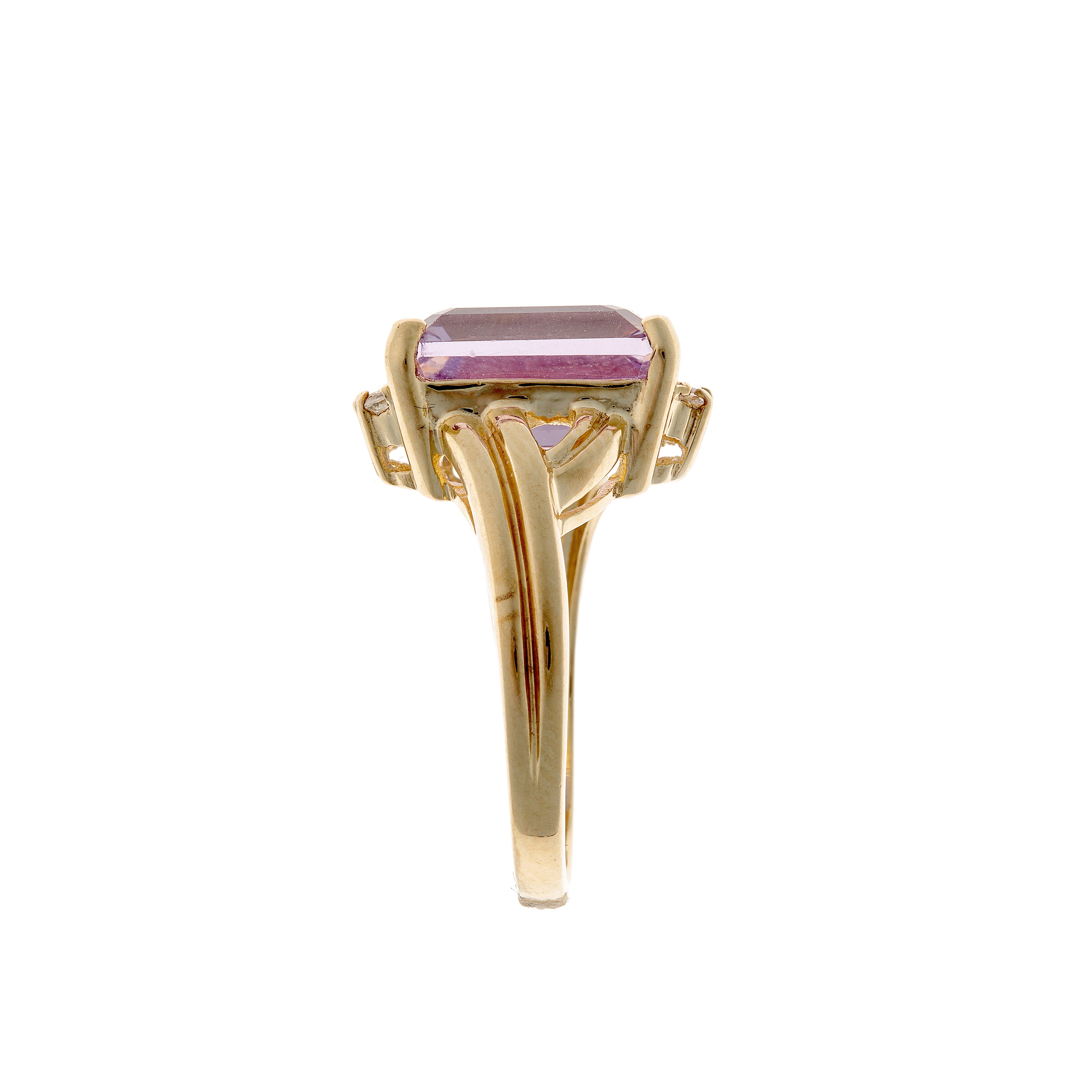 Mid-century 9k gold statement ring displaying a vibrant emerald-cut amethyst framed by topaz