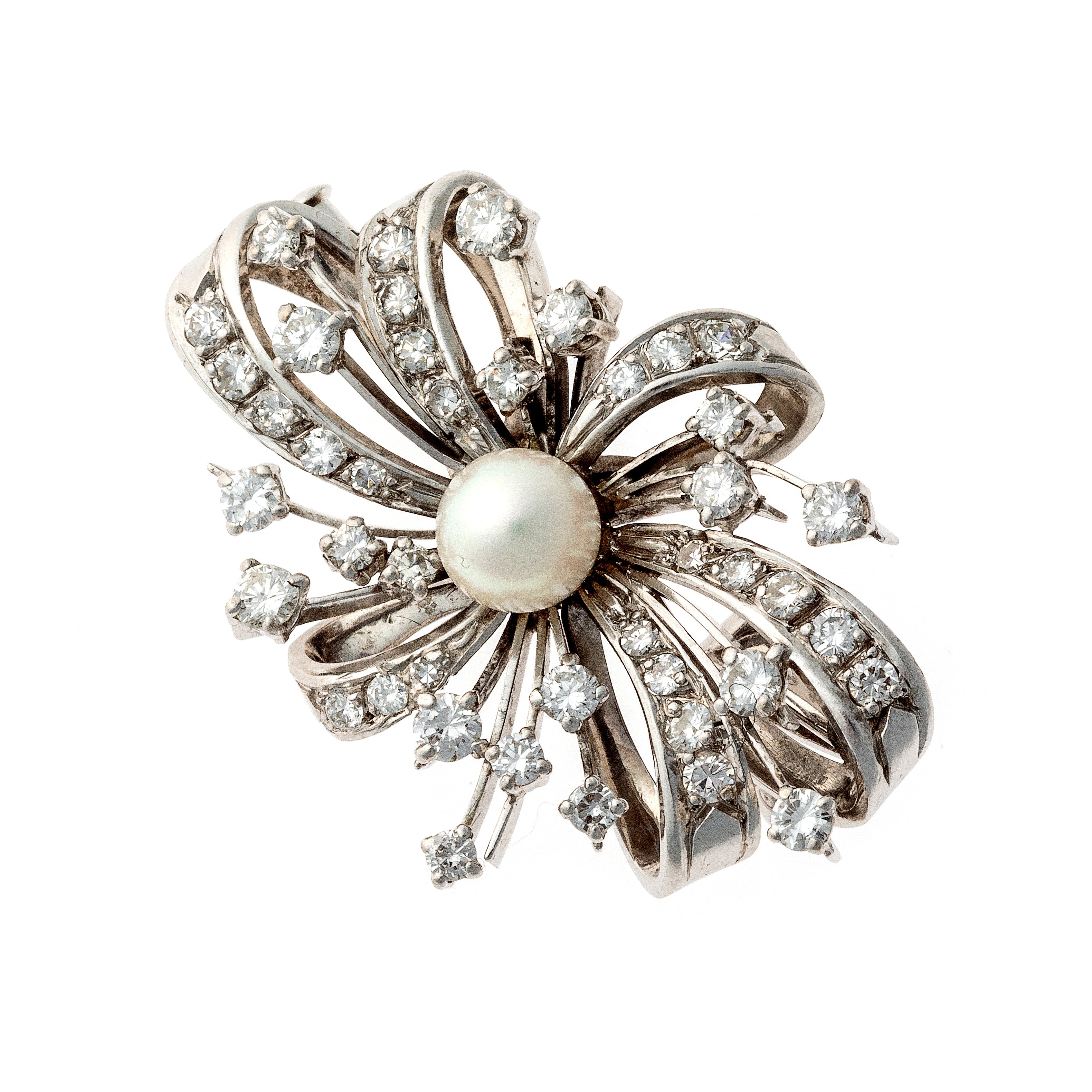 Angled view of the Mid-Century diamond and pearl white gold bow brooch pendant.