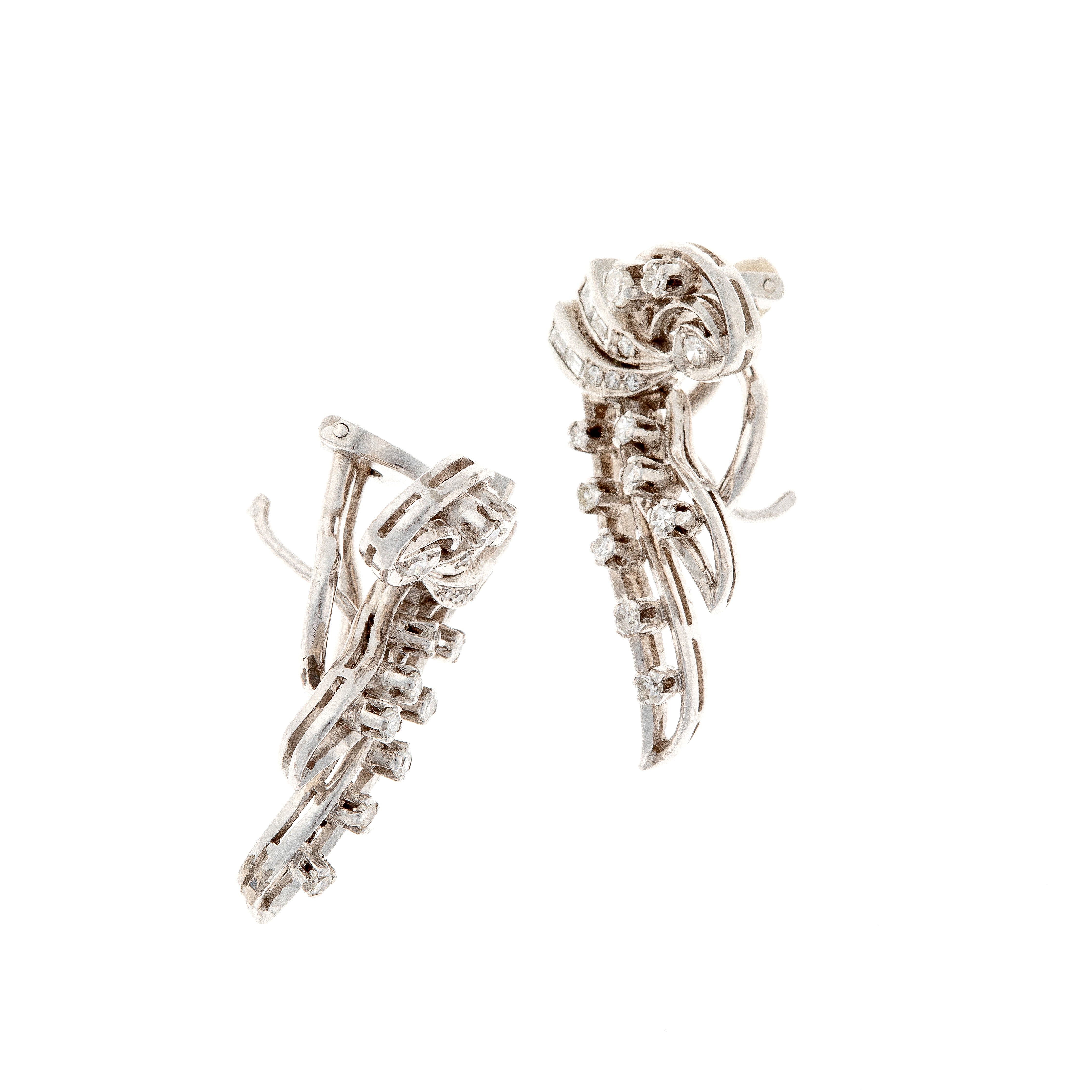Side angle of Mid-Century diamond ribbon earrings, showcasing flowing ribbon design and diamond settings.
