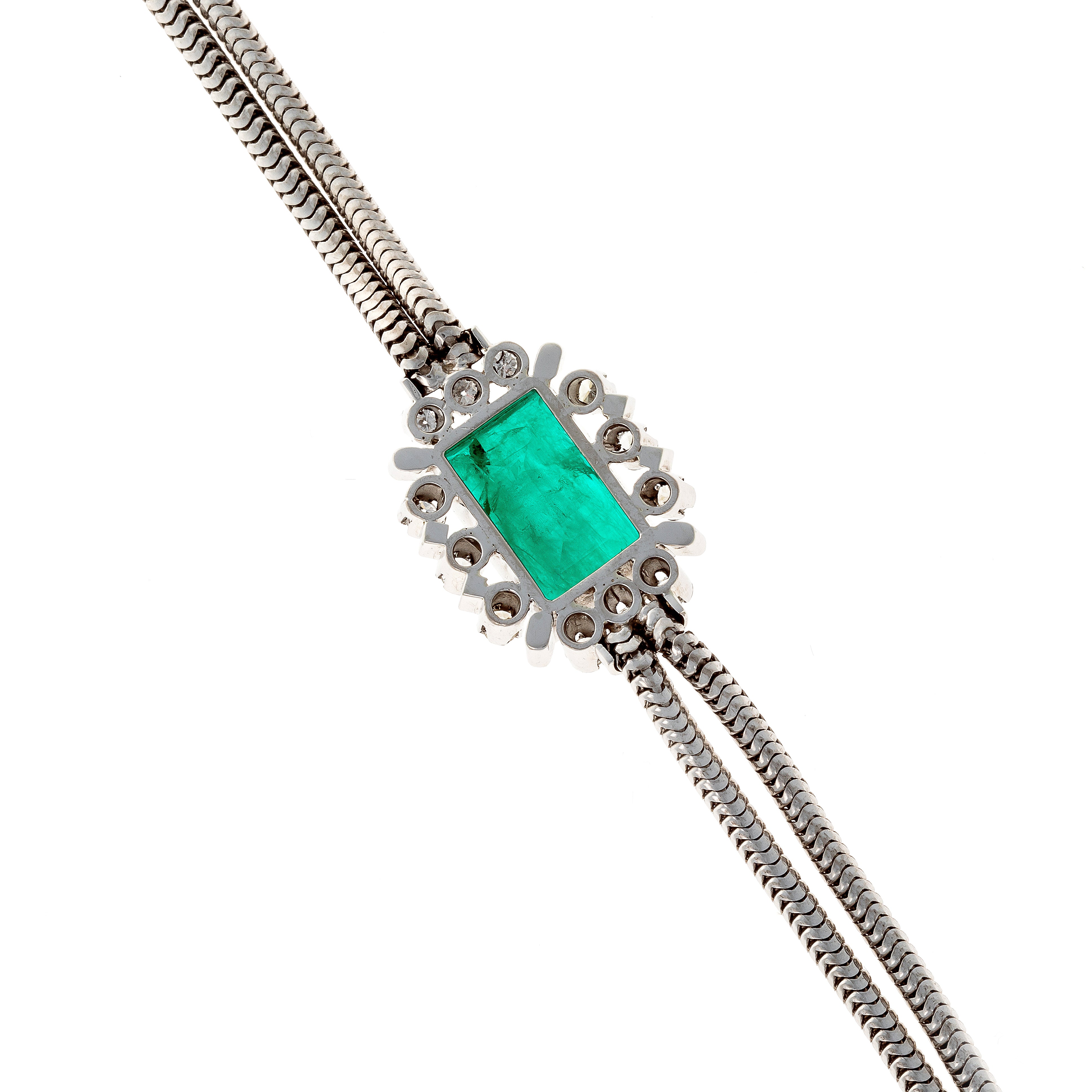 Back view of the mid-century French white gold bracelet with lab-grown emerald centerpiece and diamonds.
