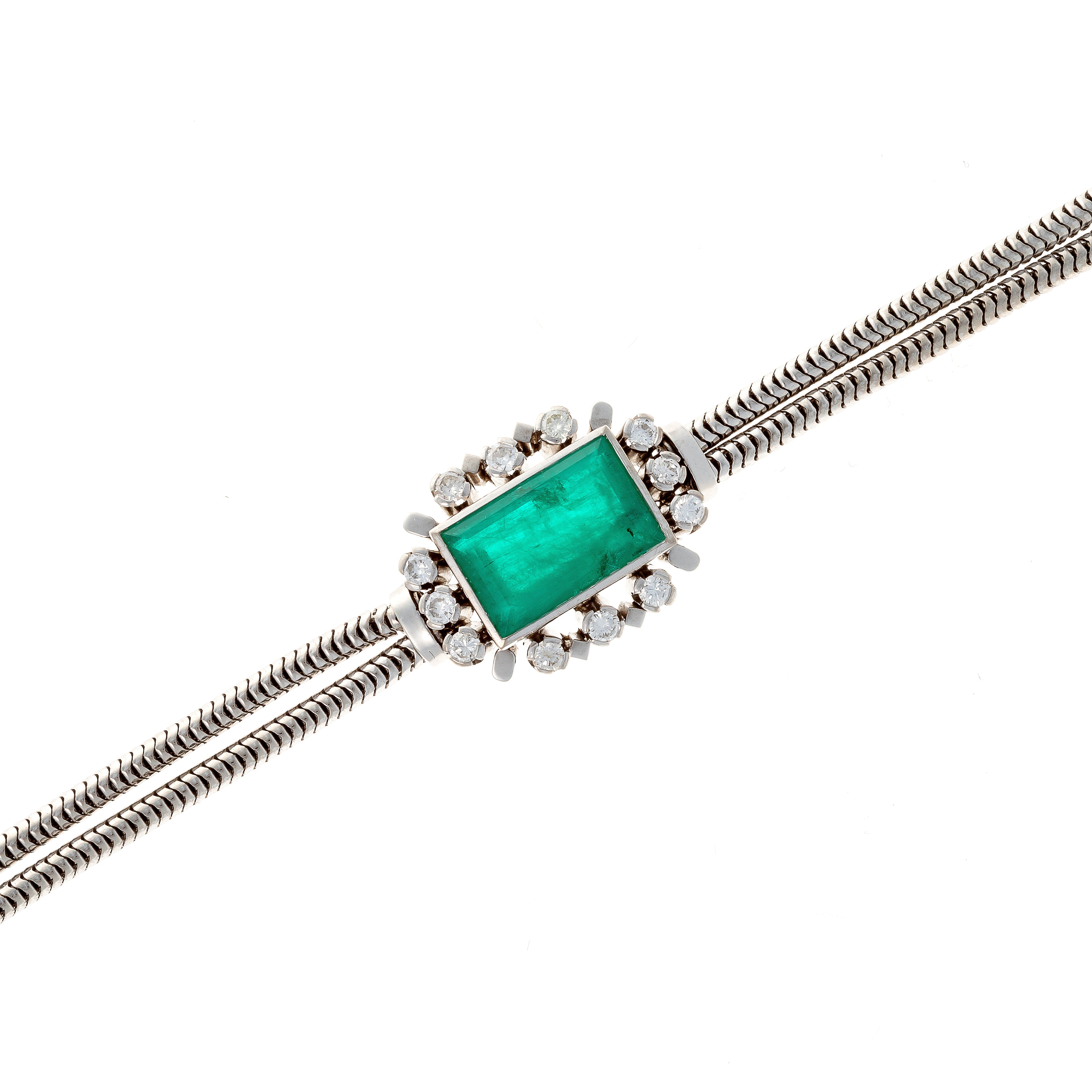 Centerpiece of the mid-century French white gold bracelet with lab-grown emerald and diamonds.
