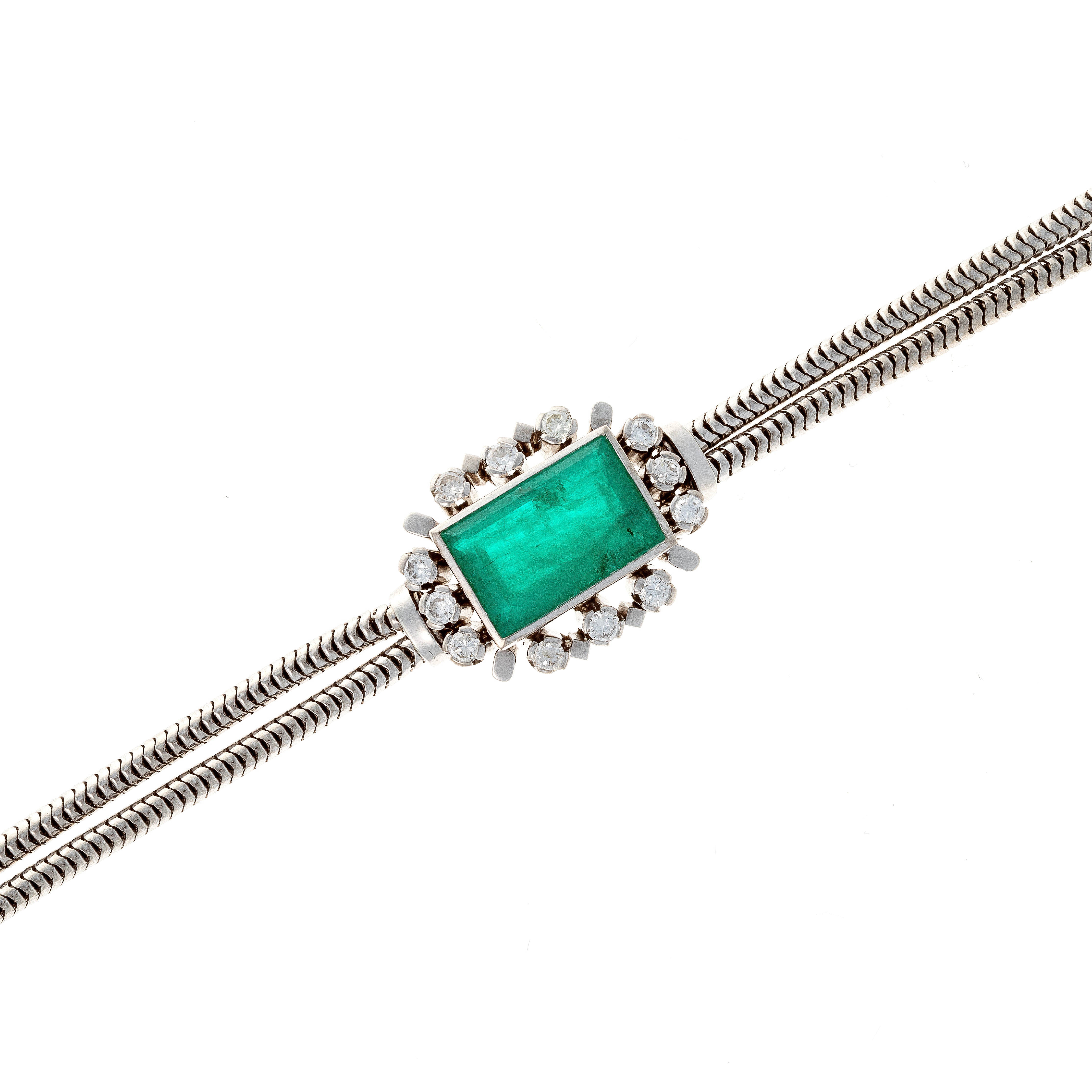 Centerpiece of the mid-century French white gold bracelet with lab-grown emerald and diamonds.