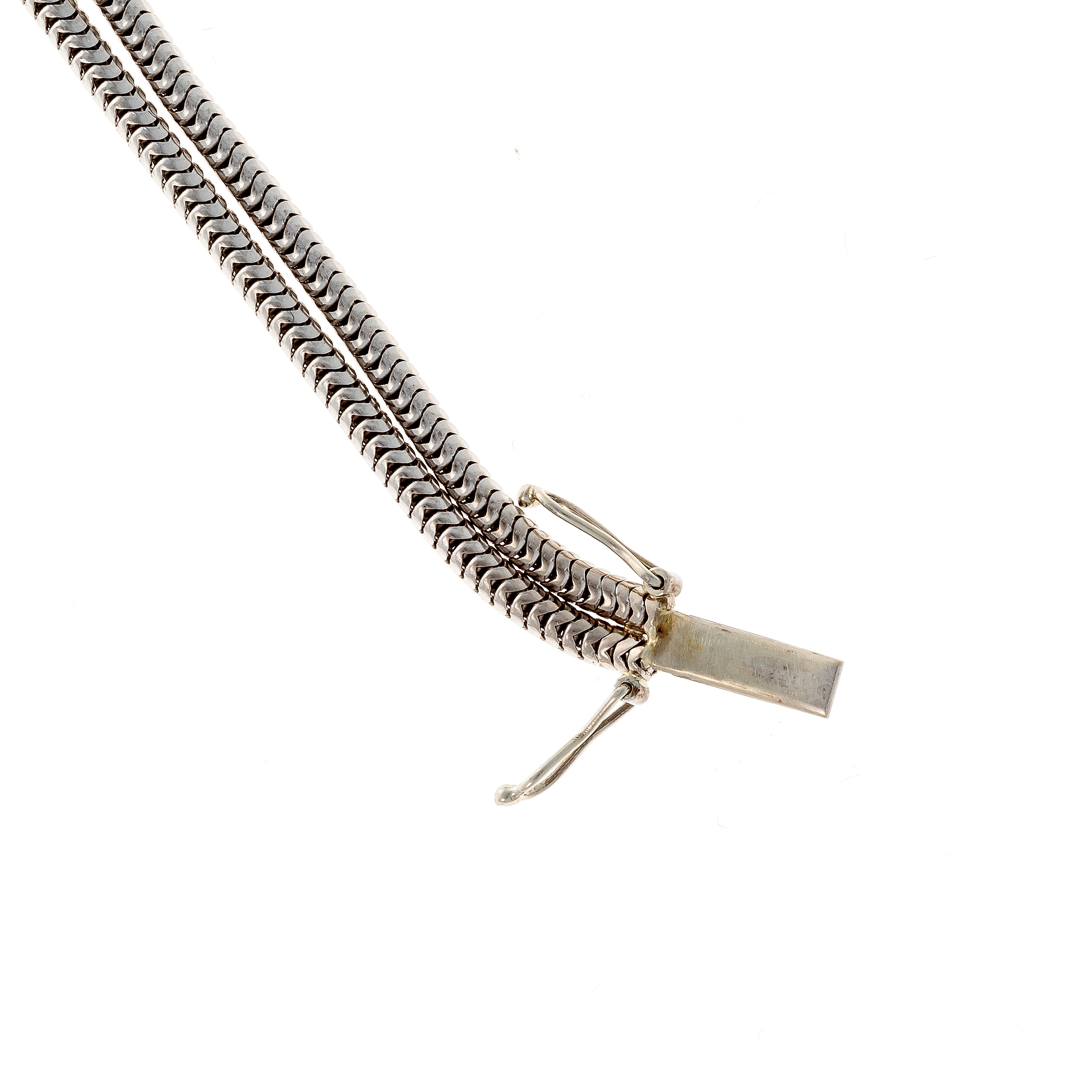 Clasp of the mid-century French white gold bracelet with lab-grown emerald centerpiece and diamonds.