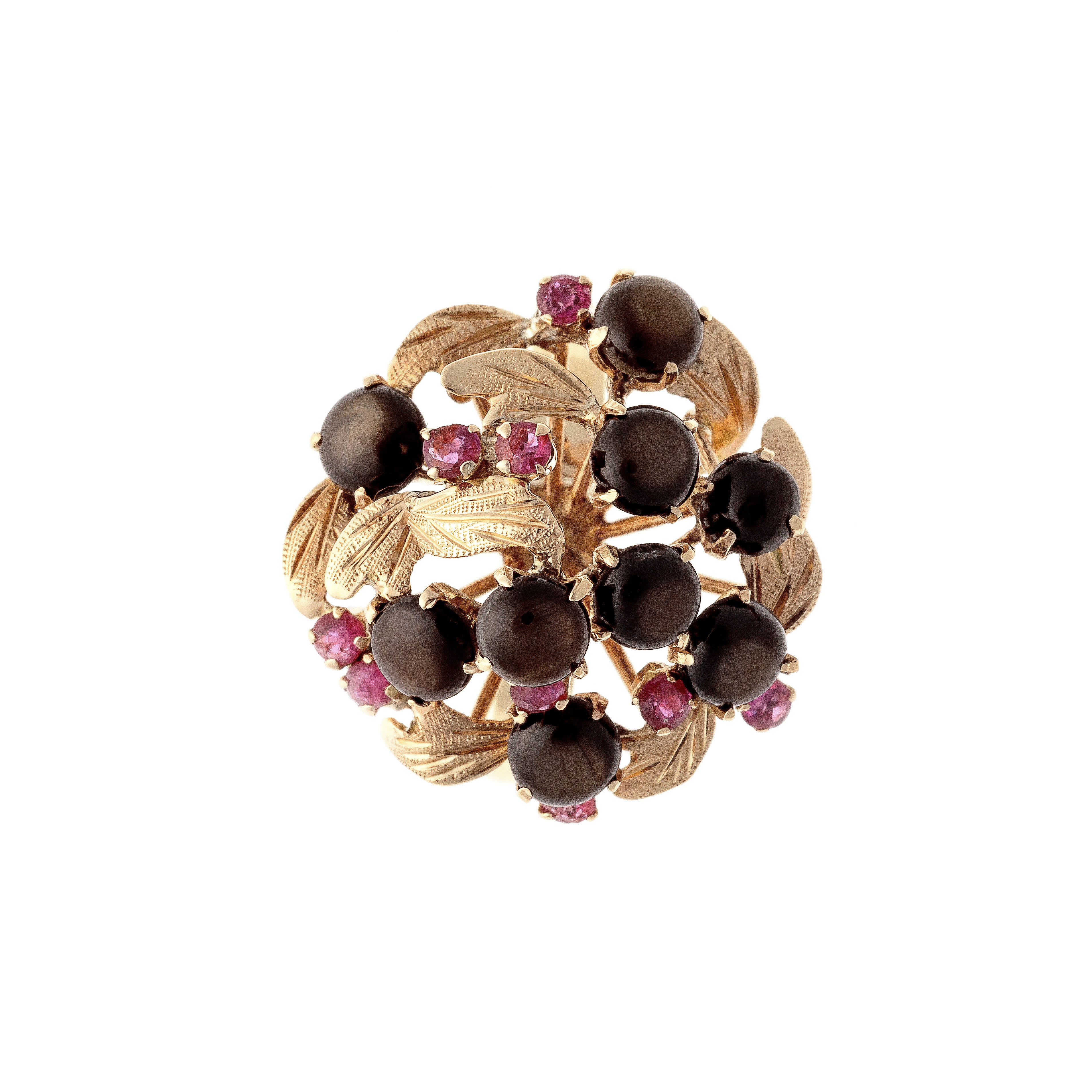 Top of the Mid-Century gold star sapphire and ruby cluster cocktail ring.